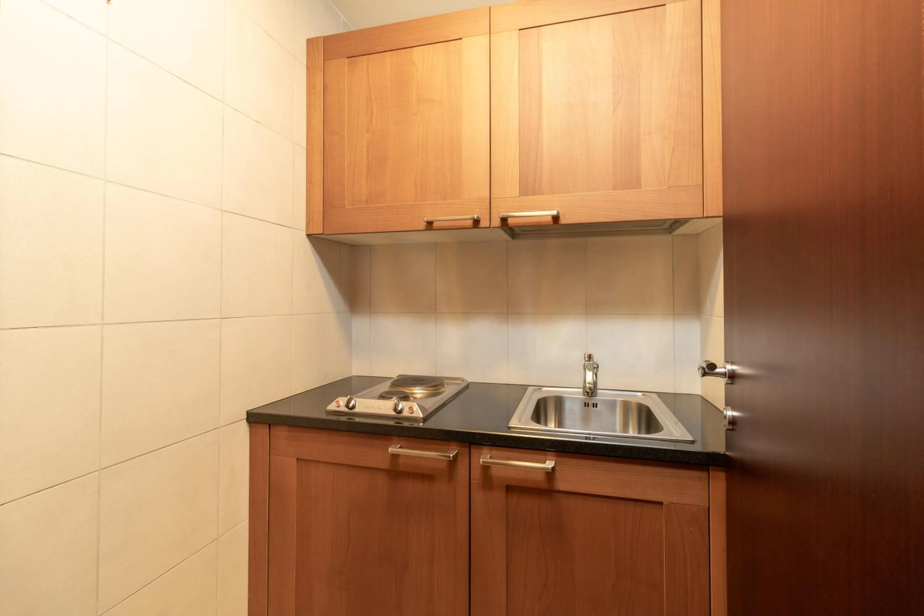 Kitchen or kitchenette in Holiday Inn Kuwait by IHG