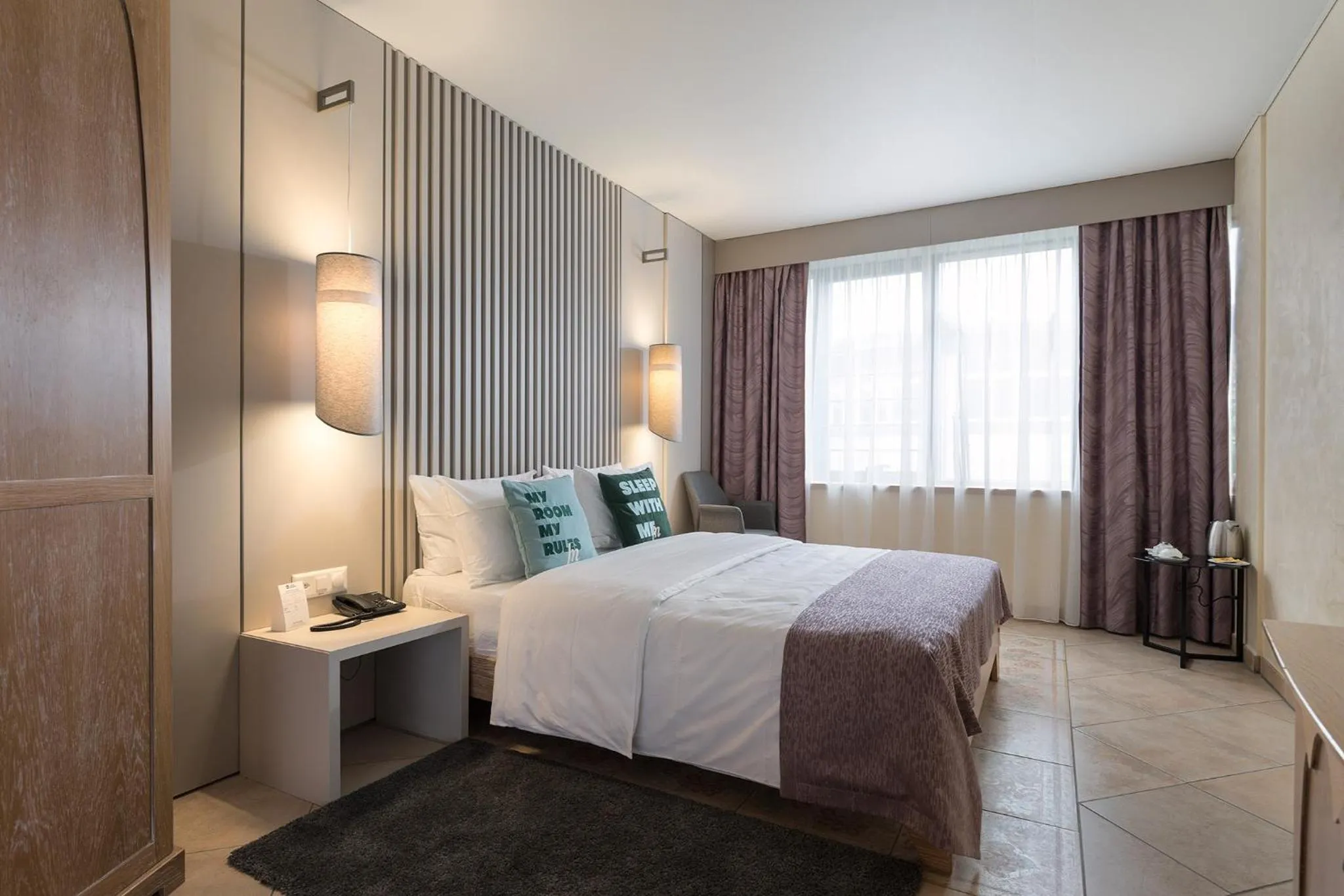 Photo of the whole room, Bed in SeePark Hotel Murten