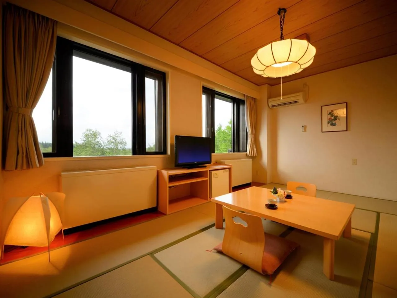Living room, Bed in Apikogen Mori no Hotel
