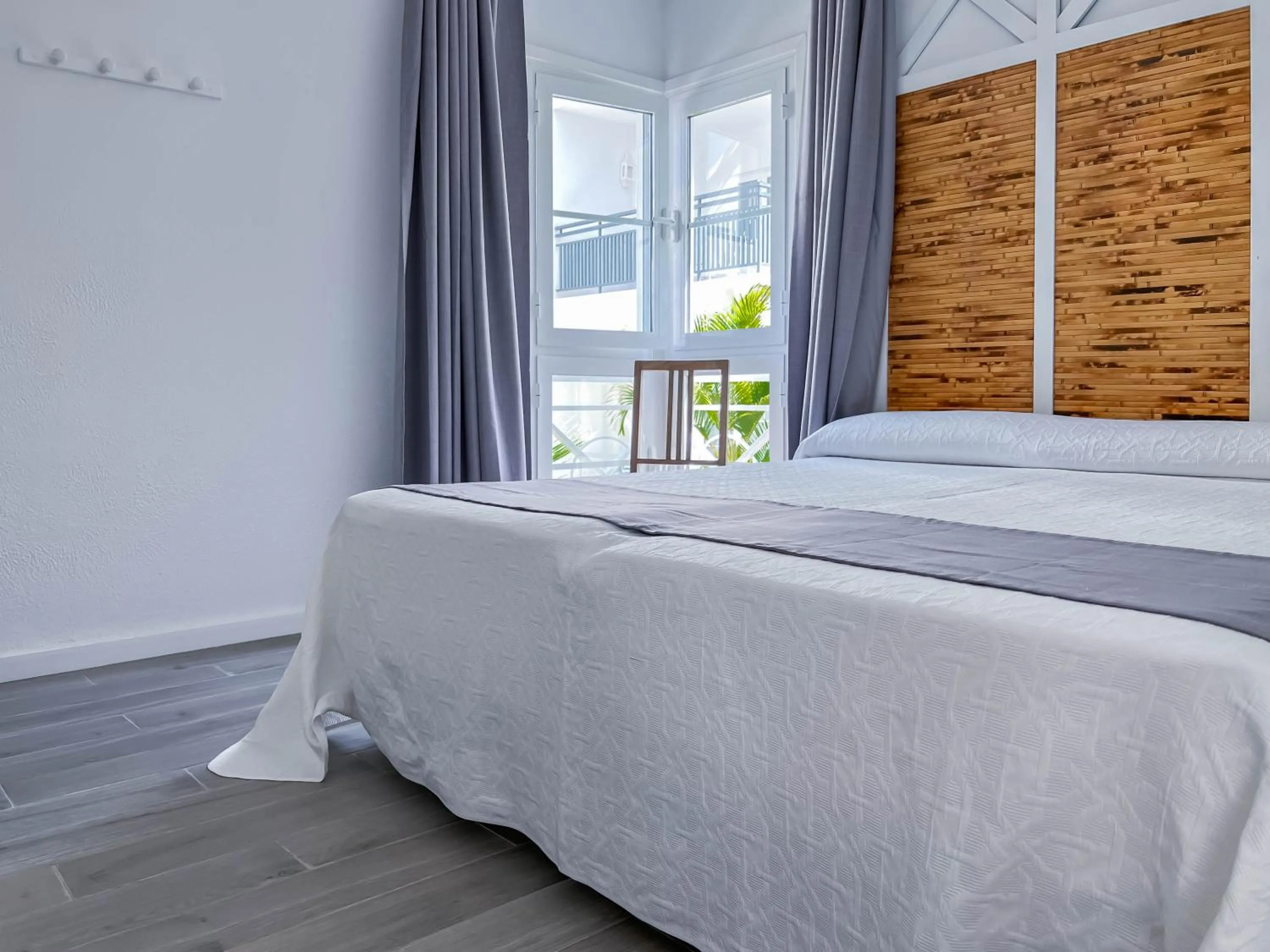 Bedroom, Bed in Apartamentos Parque del Sol