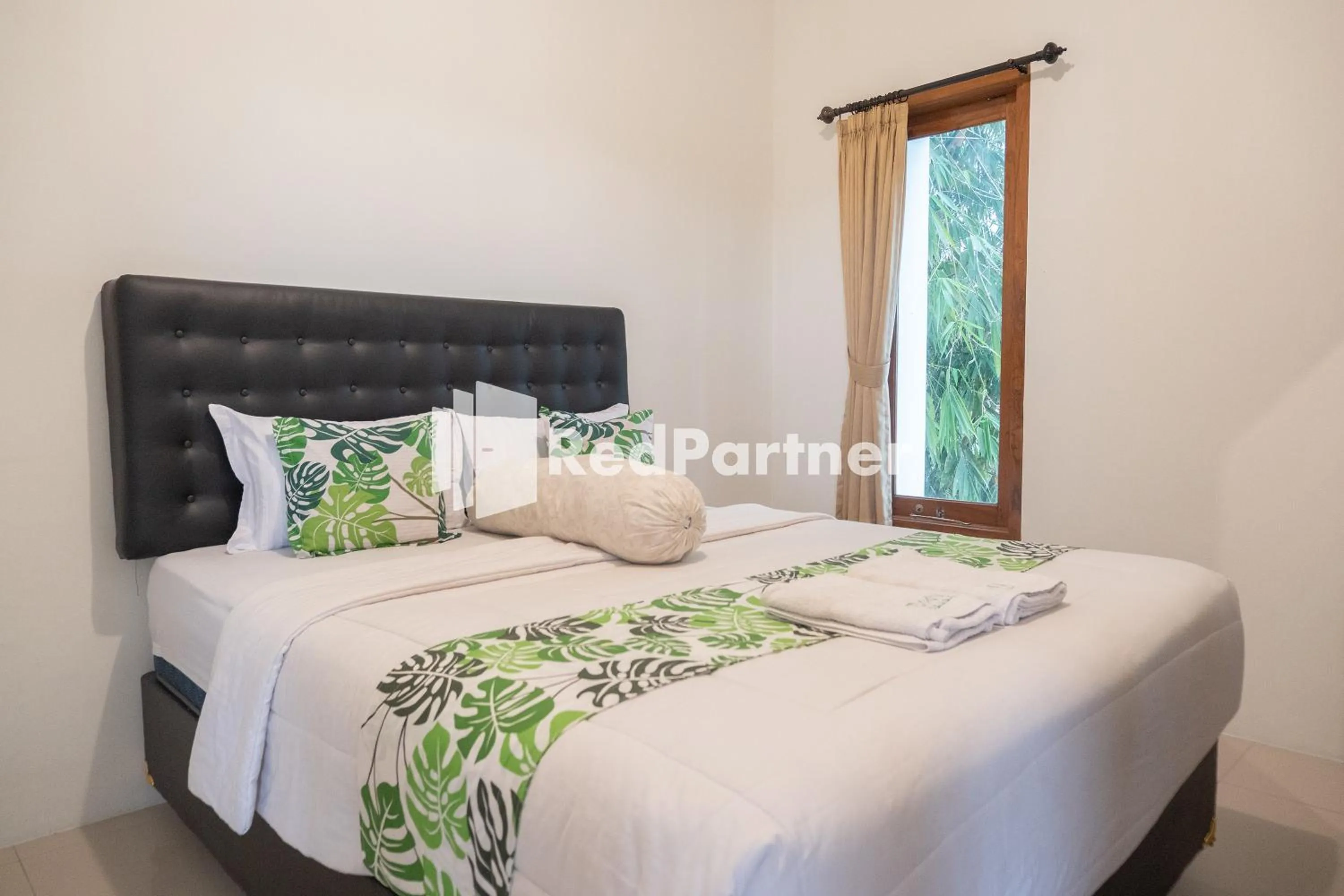 Bedroom in Twin House near UII Yogyakarta Mitra RedDoorz