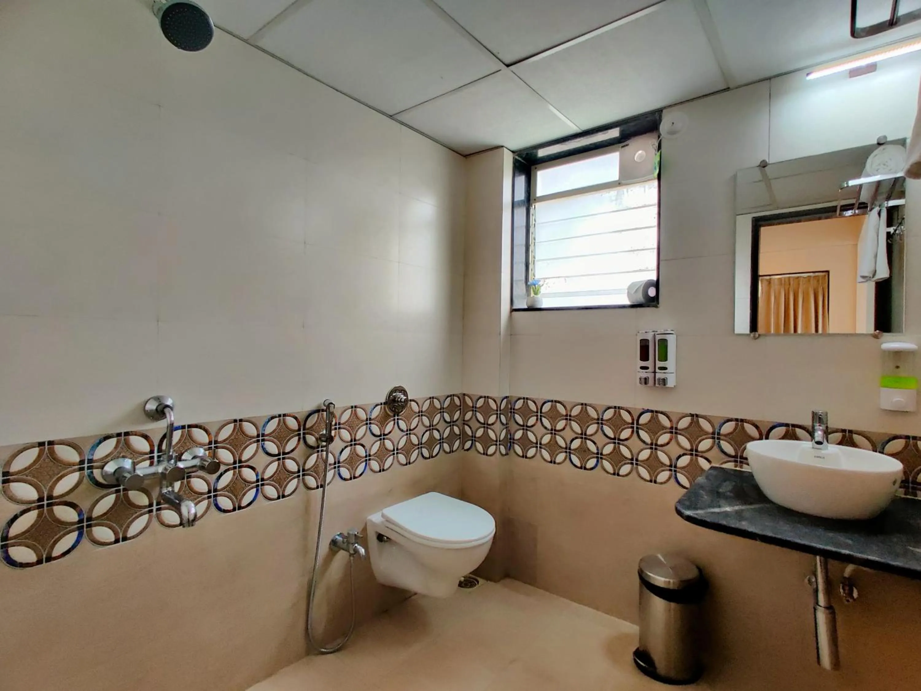 Toilet in Pushpam Sanskruti Resort Karjat