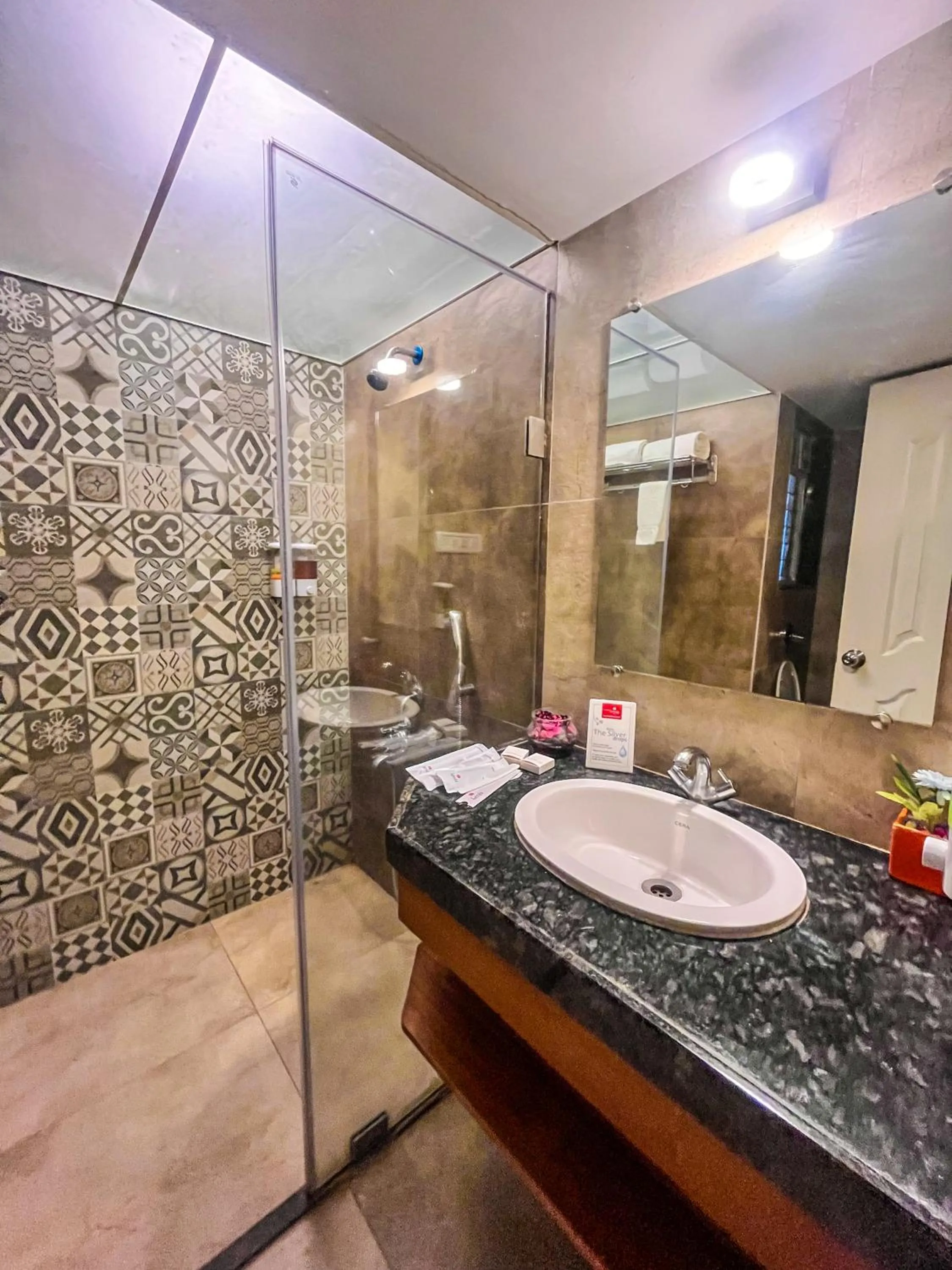 Shower in Pushpam Sanskruti Resort Karjat