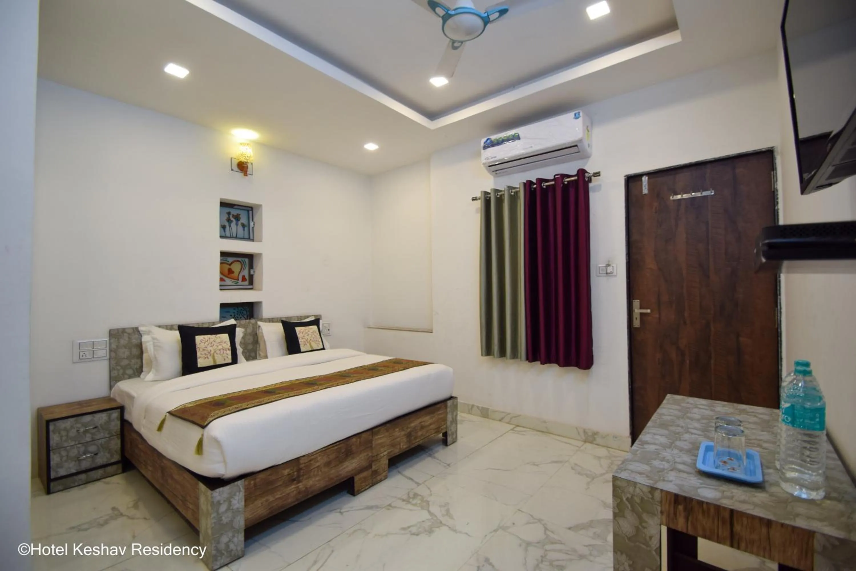 Bed in Hotel Keshav Residency