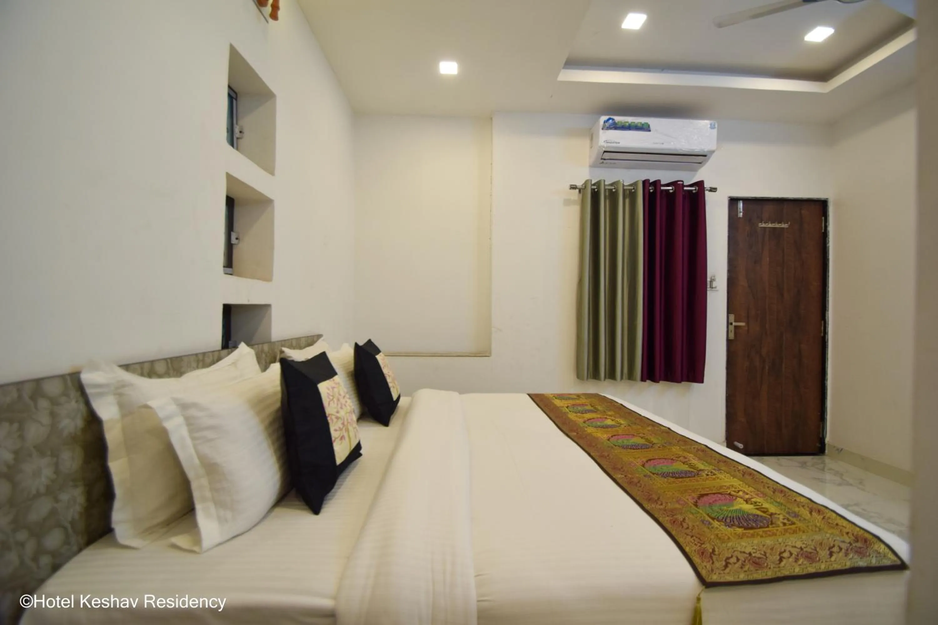 Bed in Hotel Keshav Residency