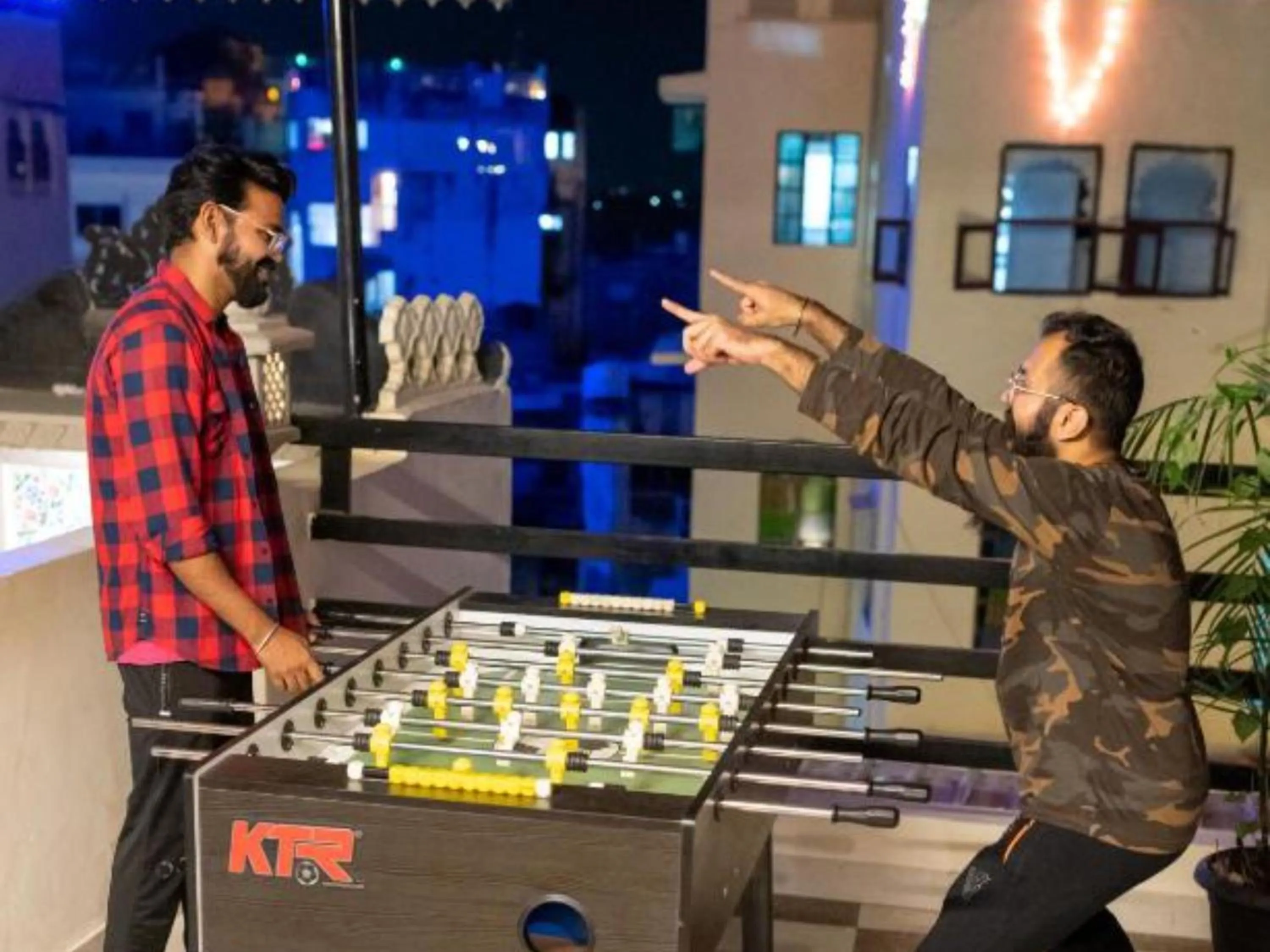 Communal lounge/ TV room in The Hosteller Udaipur