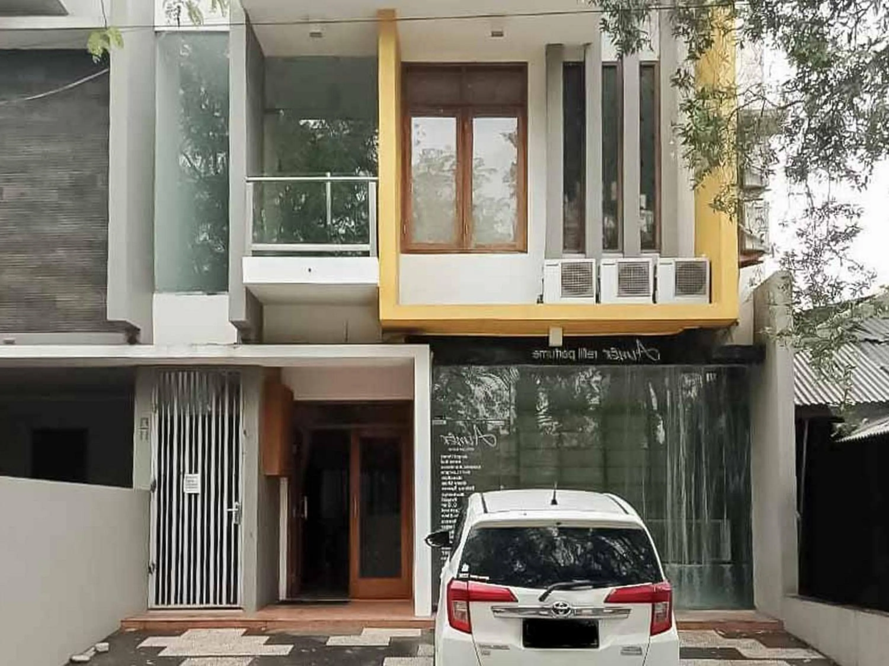 Property logo or sign in Aimer Guest House Syariah Mitra RedDoorz