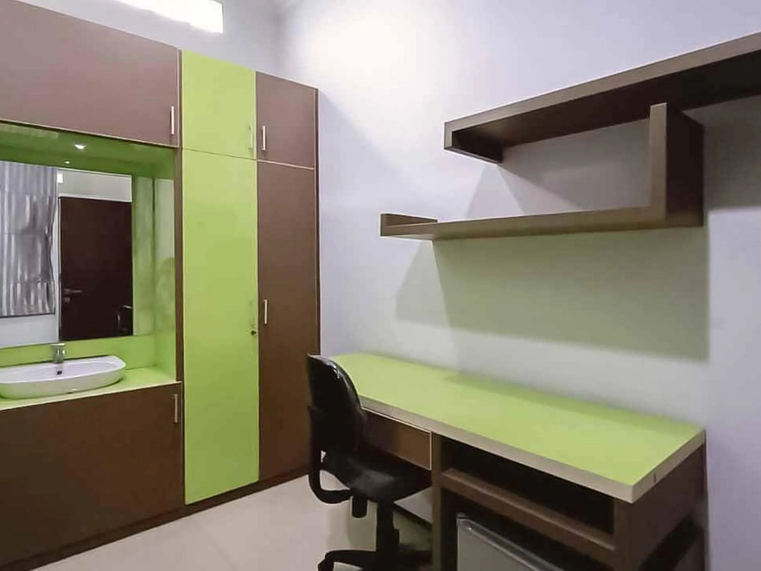 Bed in Aimer Guest House Syariah Mitra RedDoorz