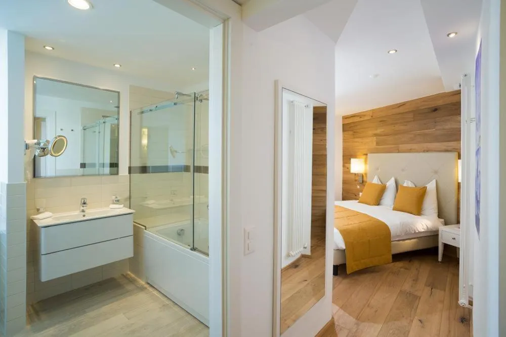 Bed in Hotel Schweizerhof Pontresina