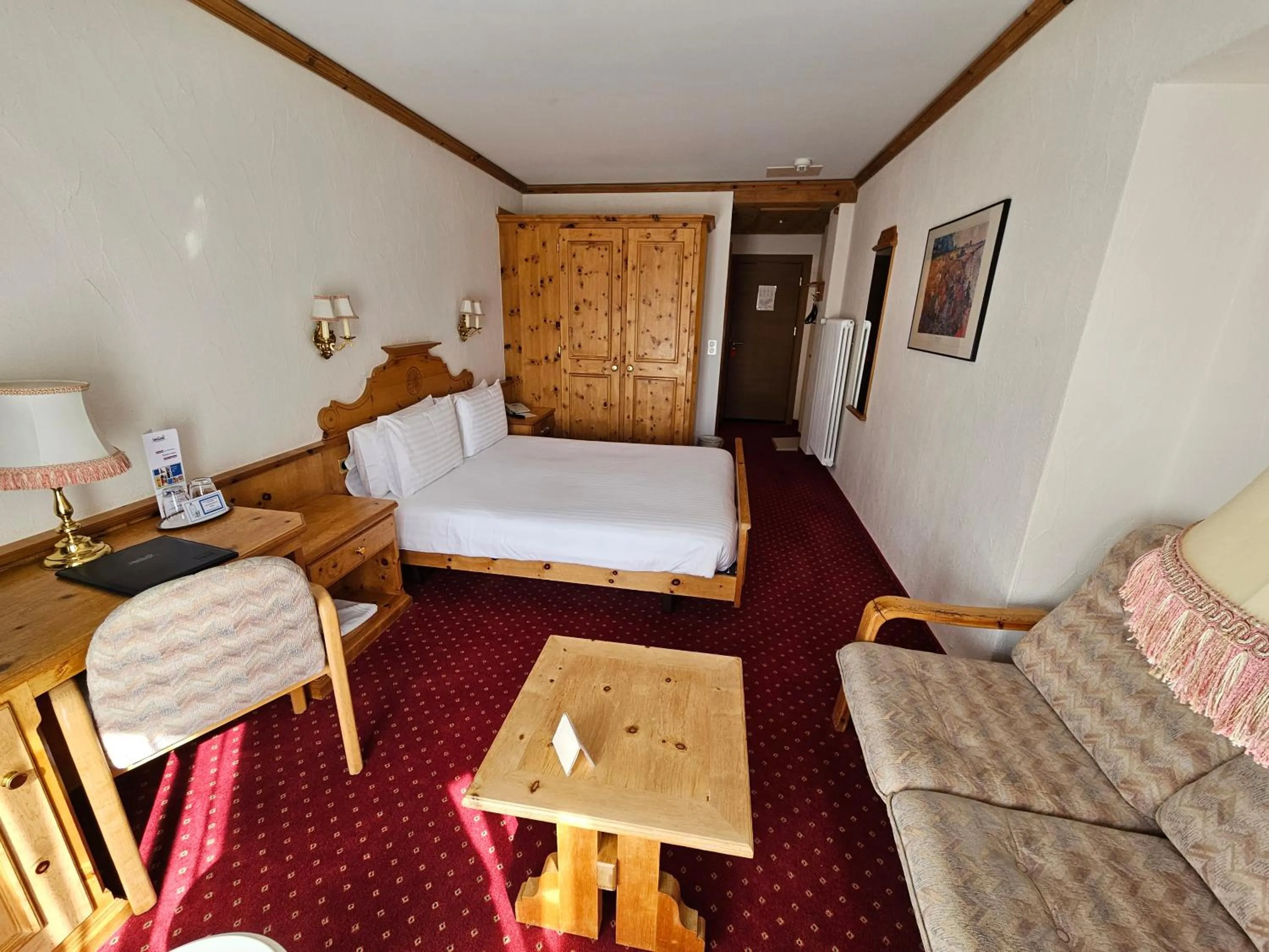 Bed in Hotel Schweizerhof Pontresina