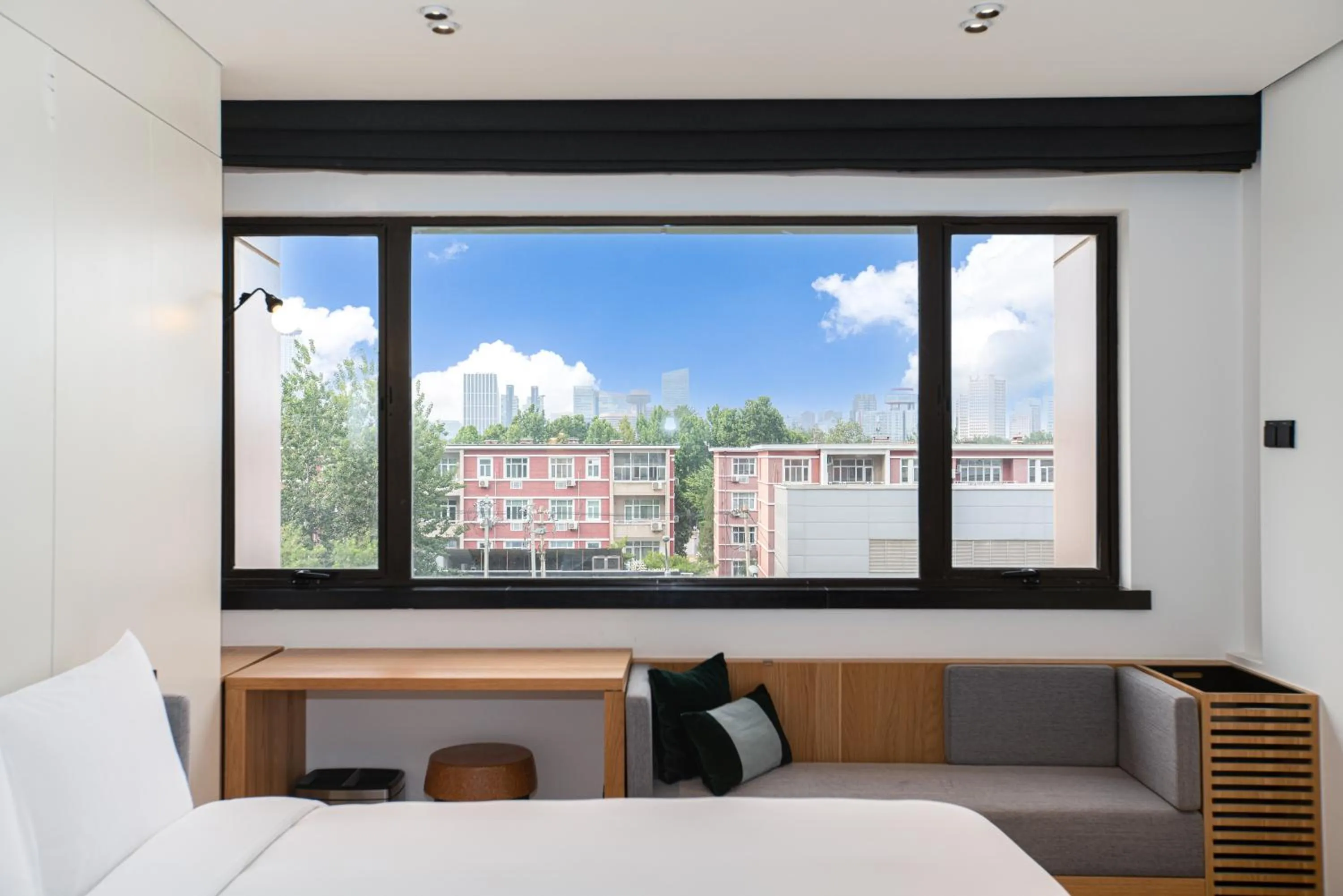 Bed in Stey Beijing Sanlitun Boutique Hotel