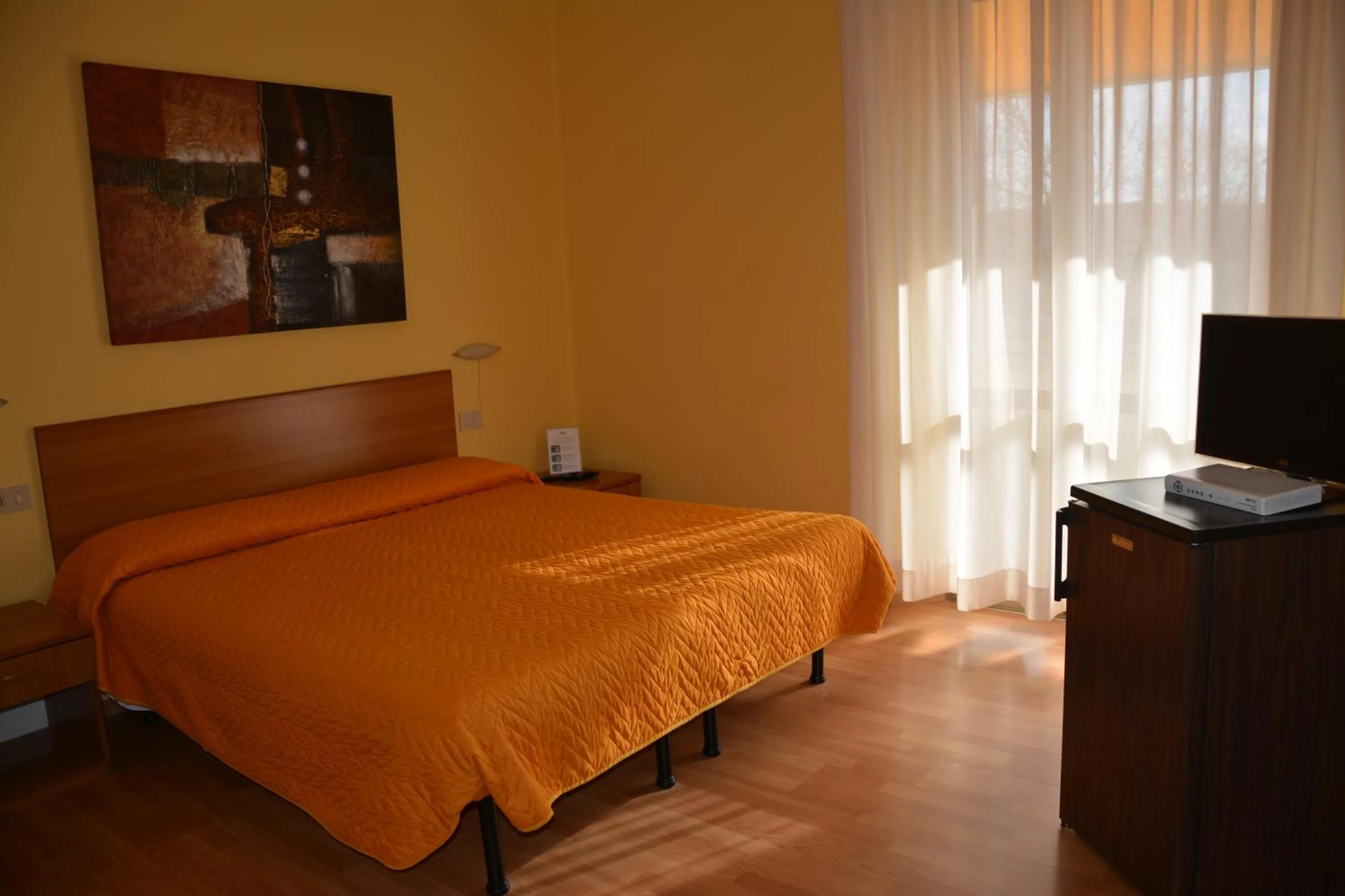 Bed in Piccolo Hotel