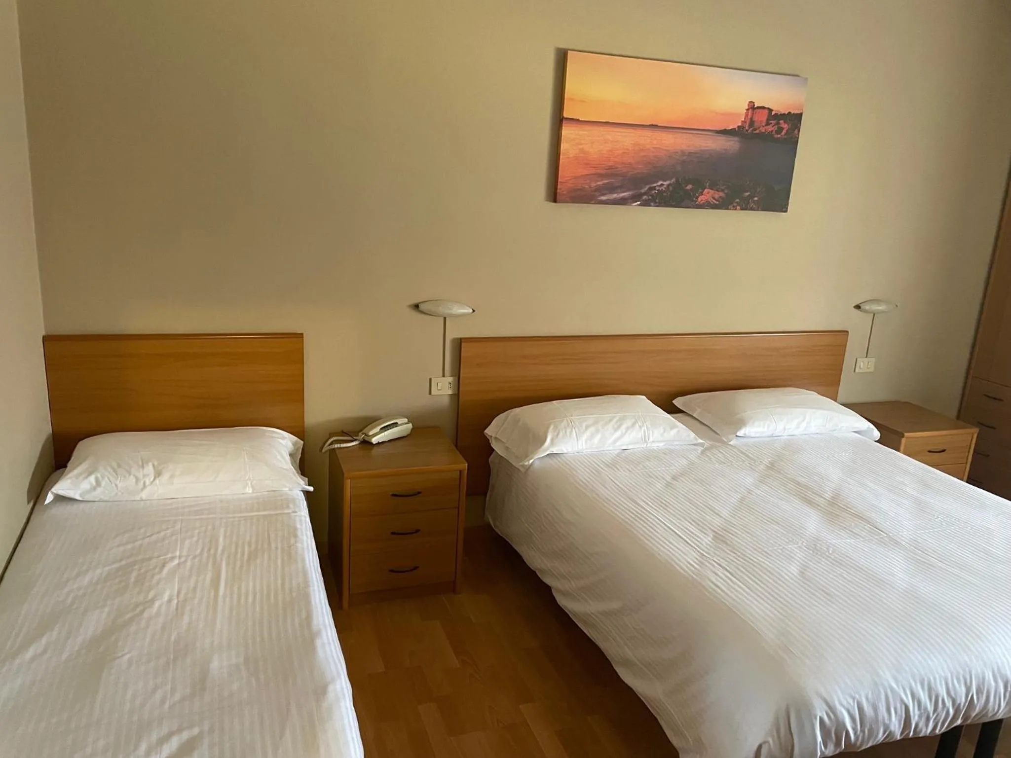 Bed in Piccolo Hotel