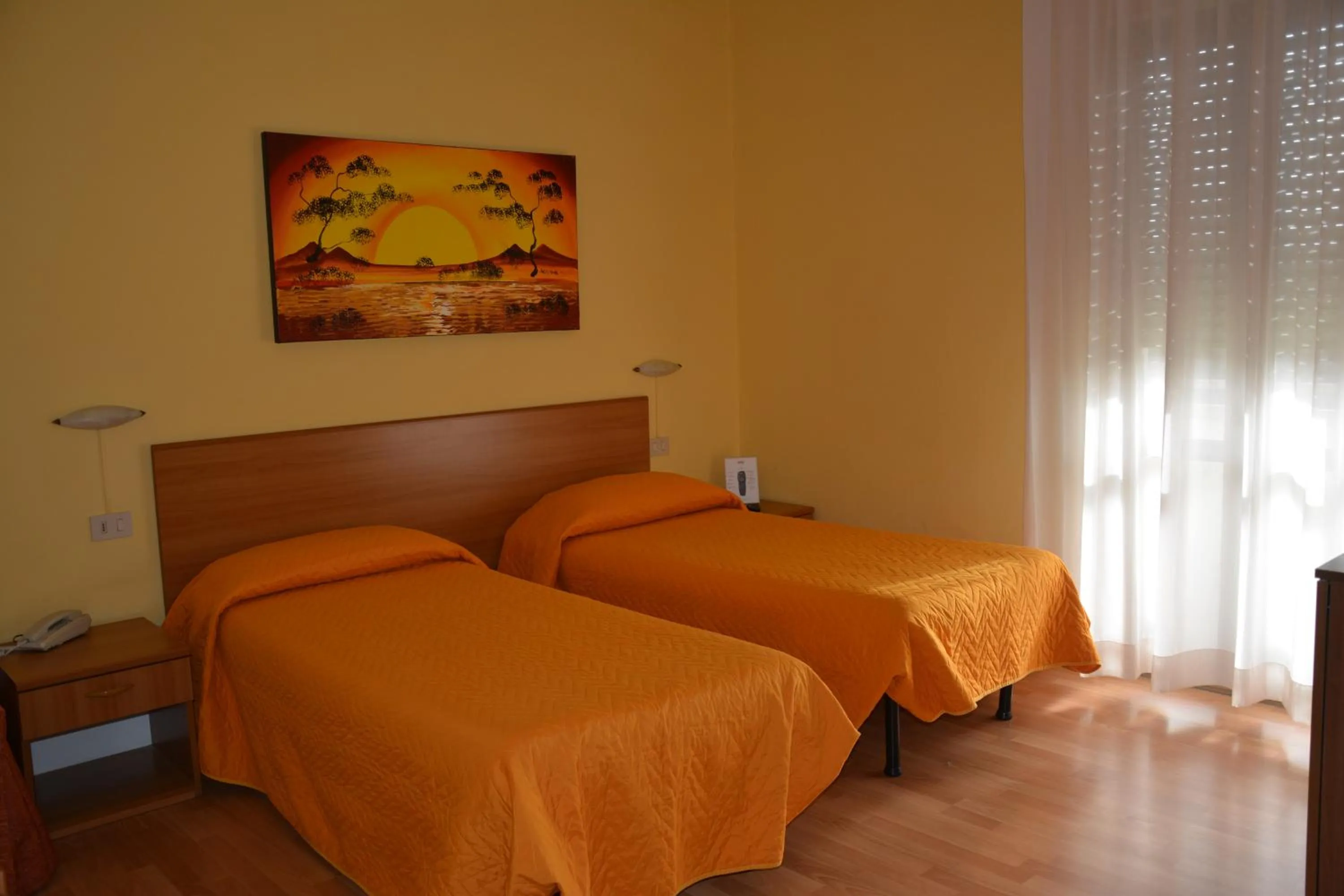 Bed in Piccolo Hotel