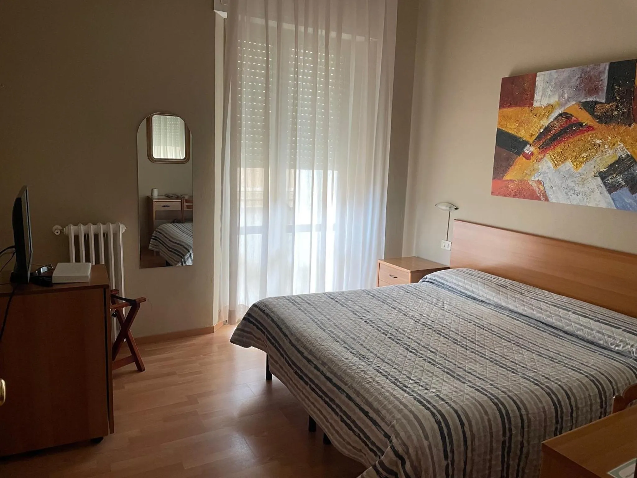 Bed in Piccolo Hotel