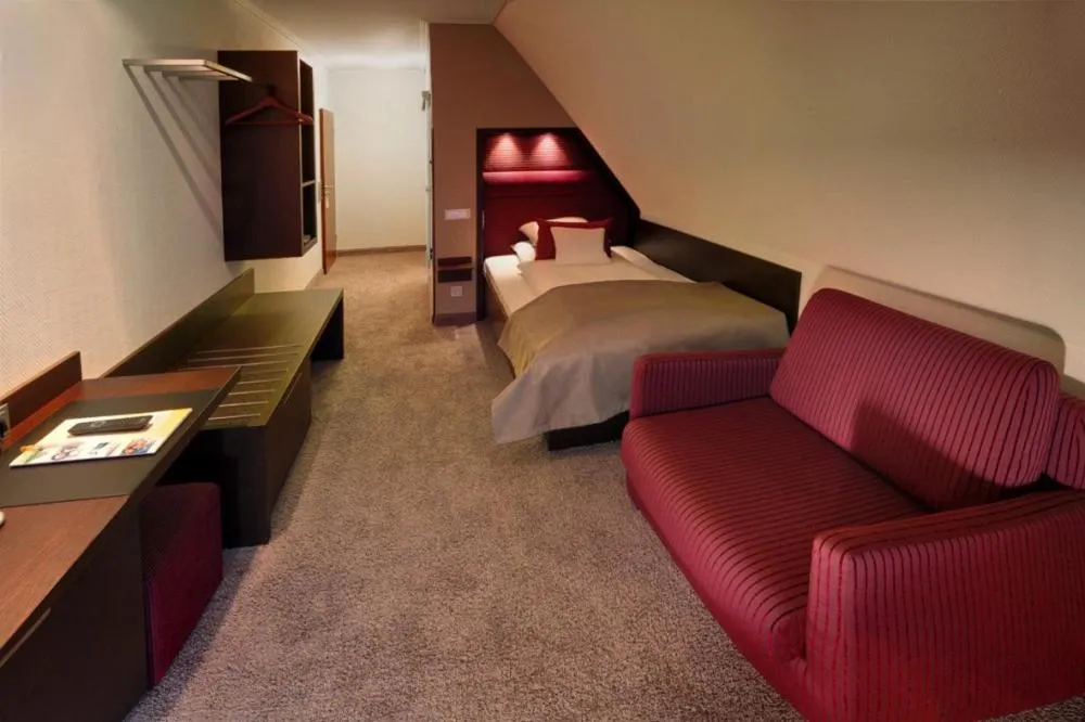 Photo of the whole room, Bed in Hotel Am Markt Nordenham