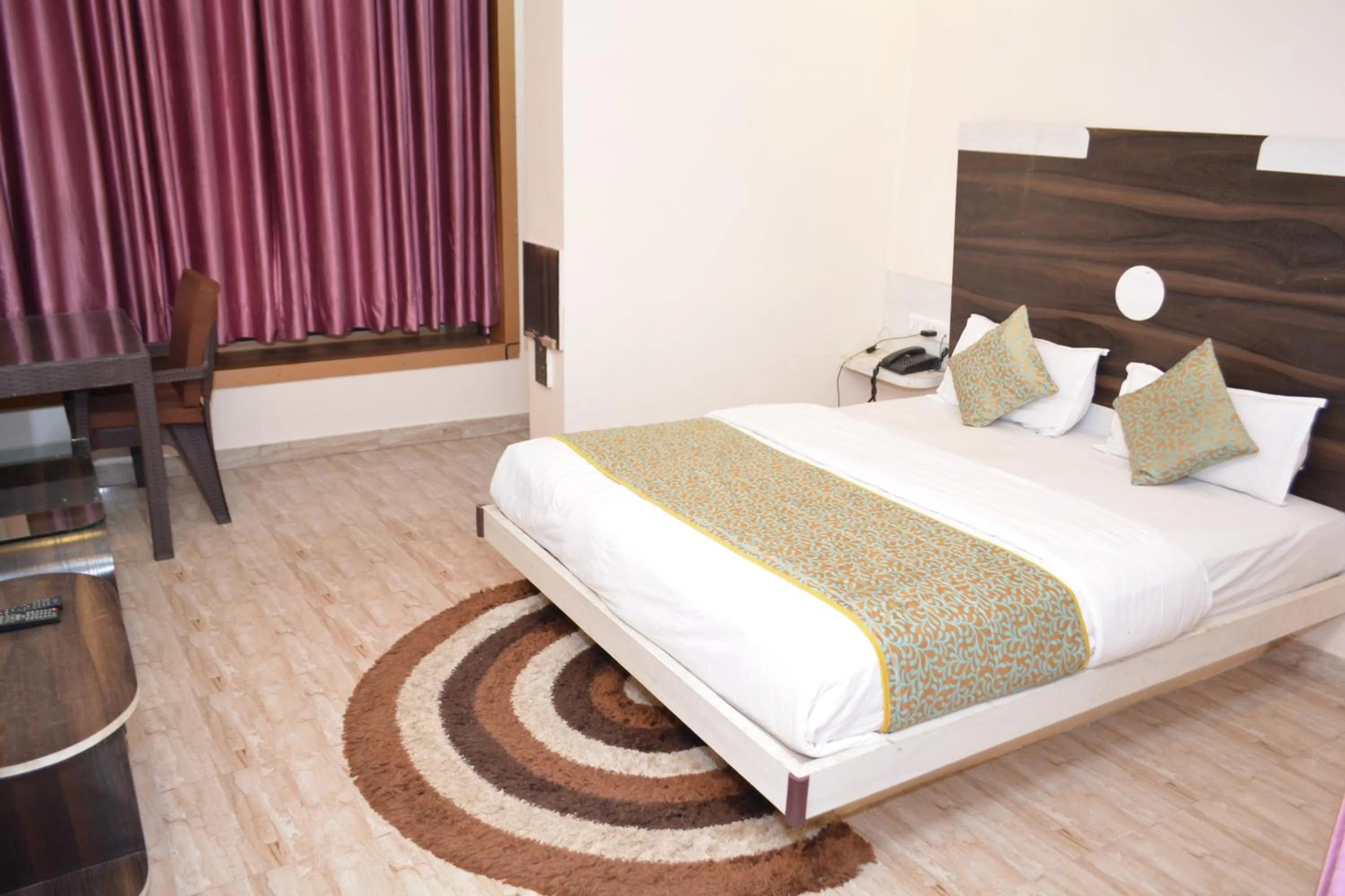 Bed in Hotel Comfort and Terrace Lounge