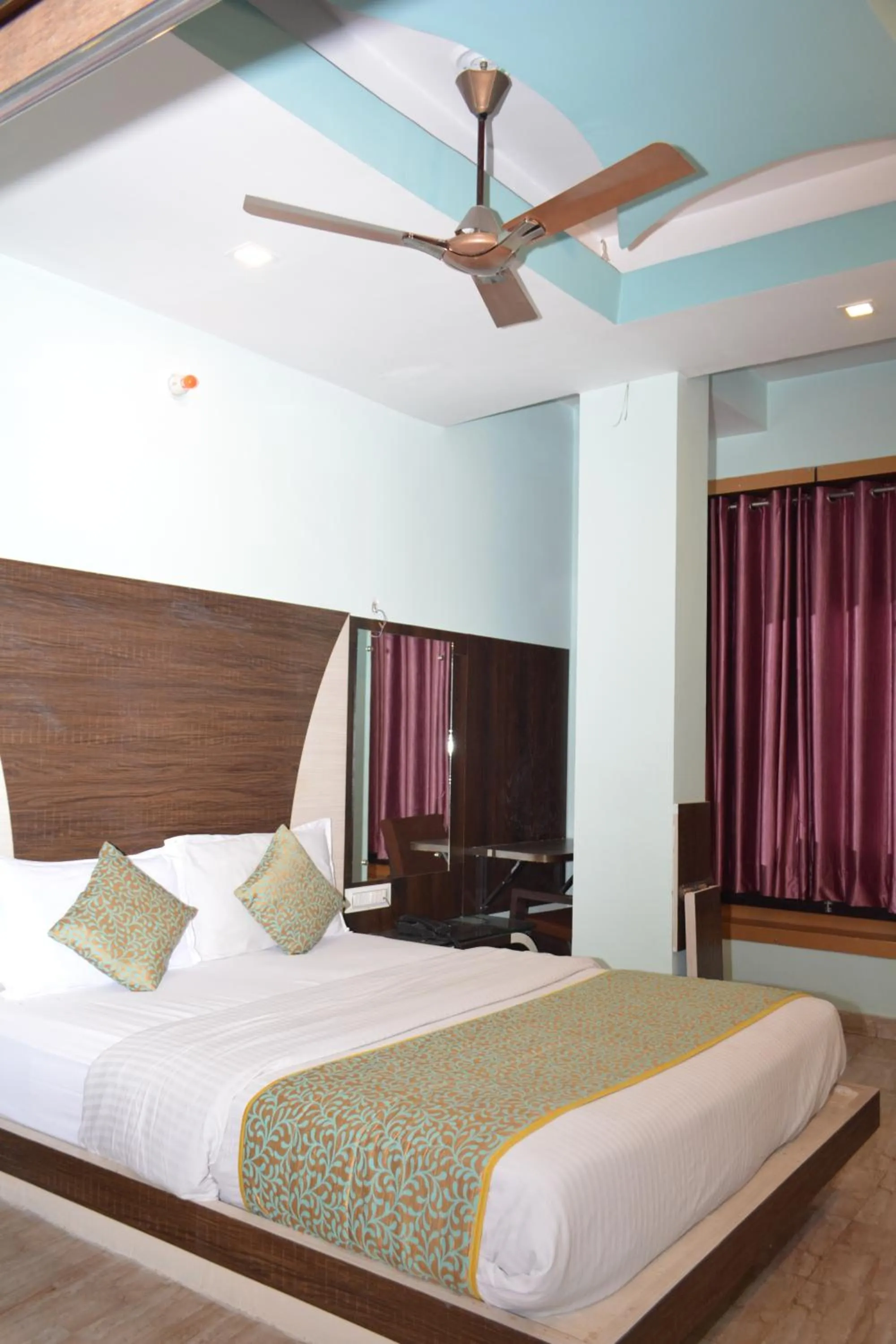 Bed in Hotel Comfort and Terrace Lounge