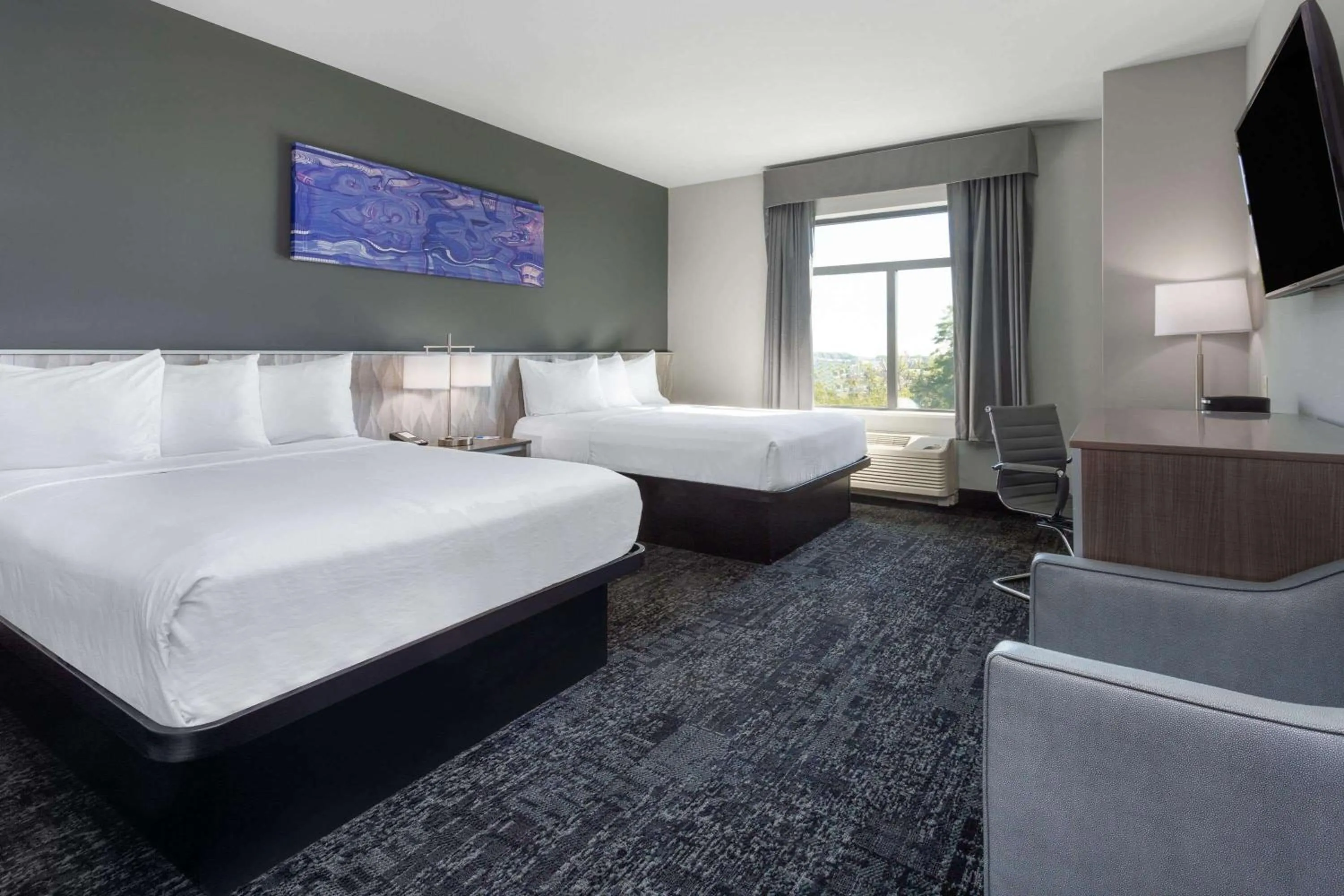 Photo of the whole room, Bed in Baymont by Wyndham Madison