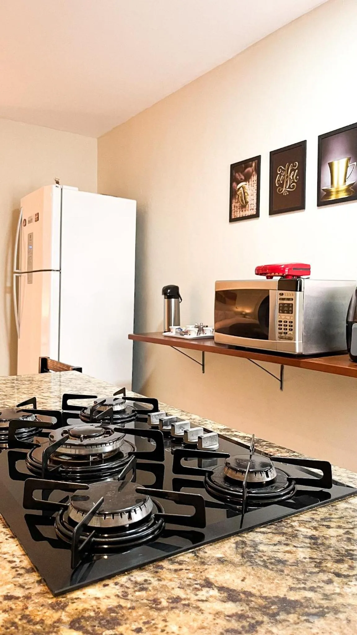 Kitchen or kitchenette in Pousada Entre Folhas