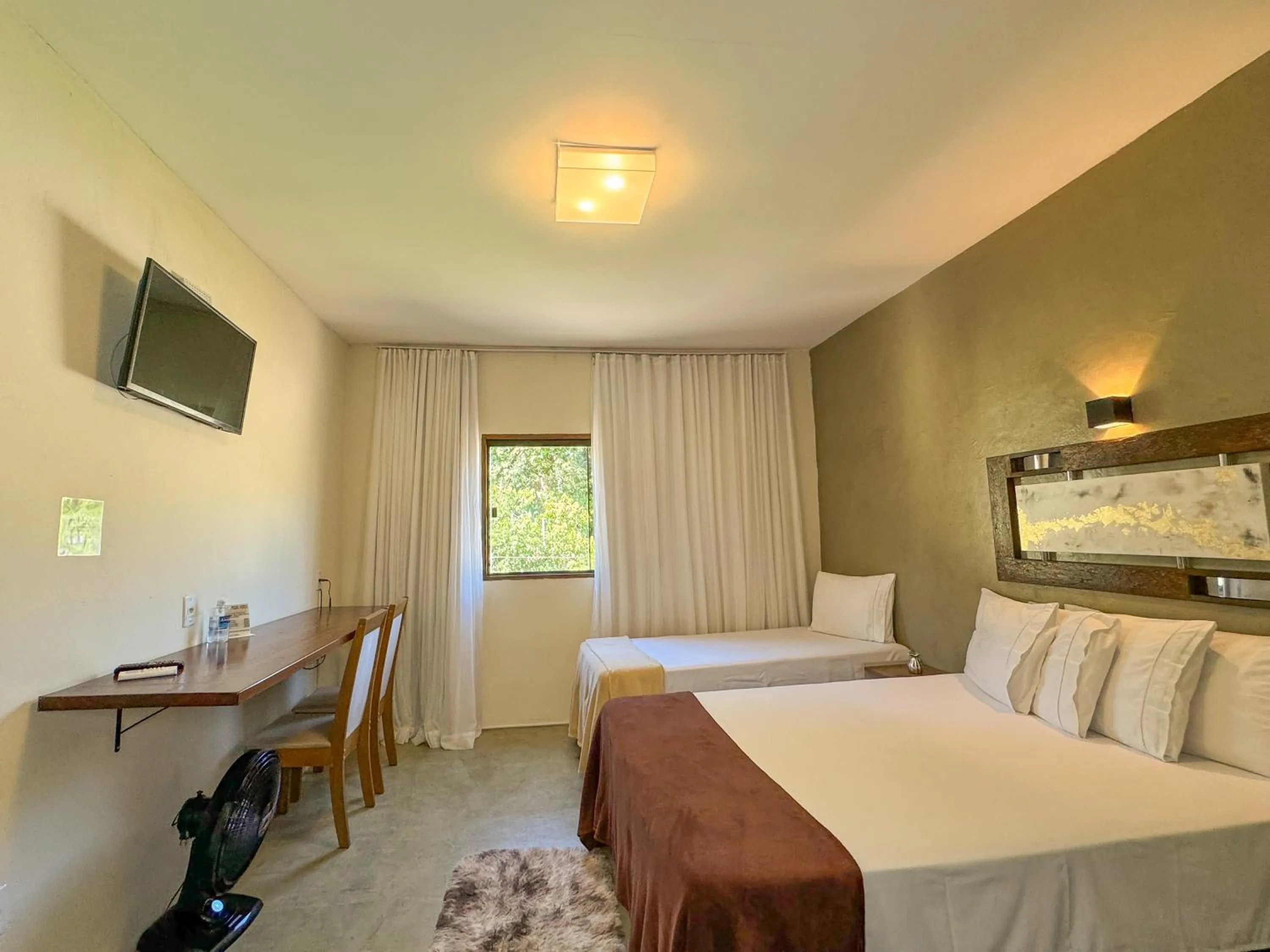 Bed in Pousada Entre Folhas