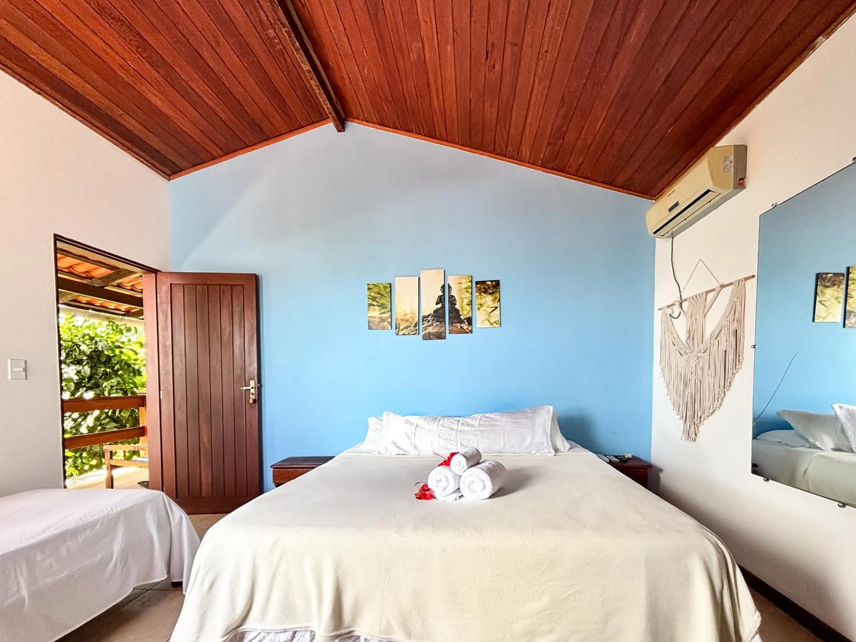 Bed in Chez Max Pousada