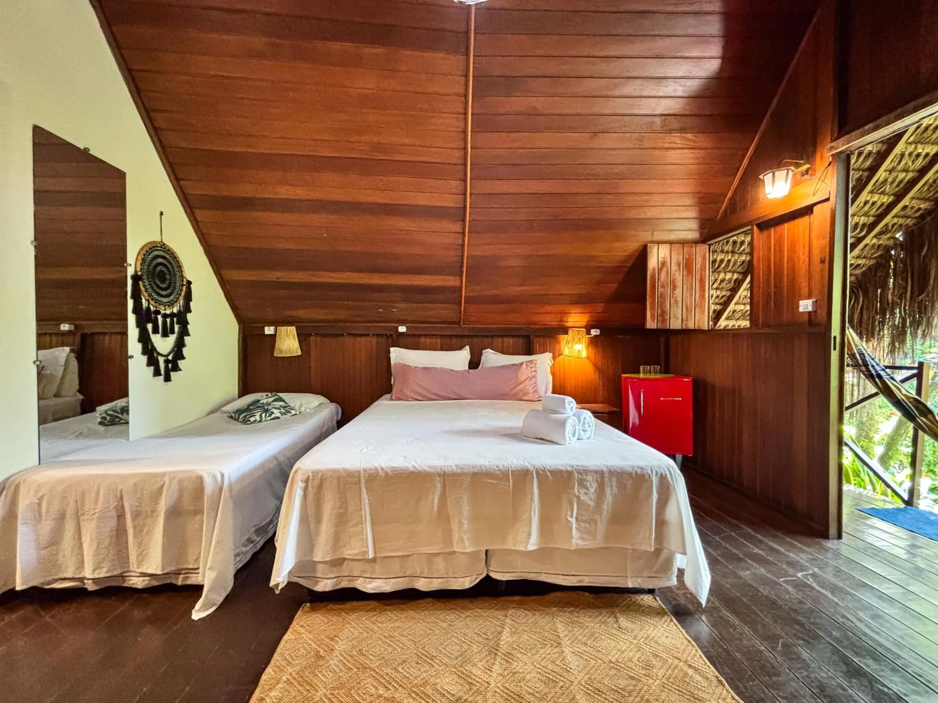 Bed in Chez Max Pousada