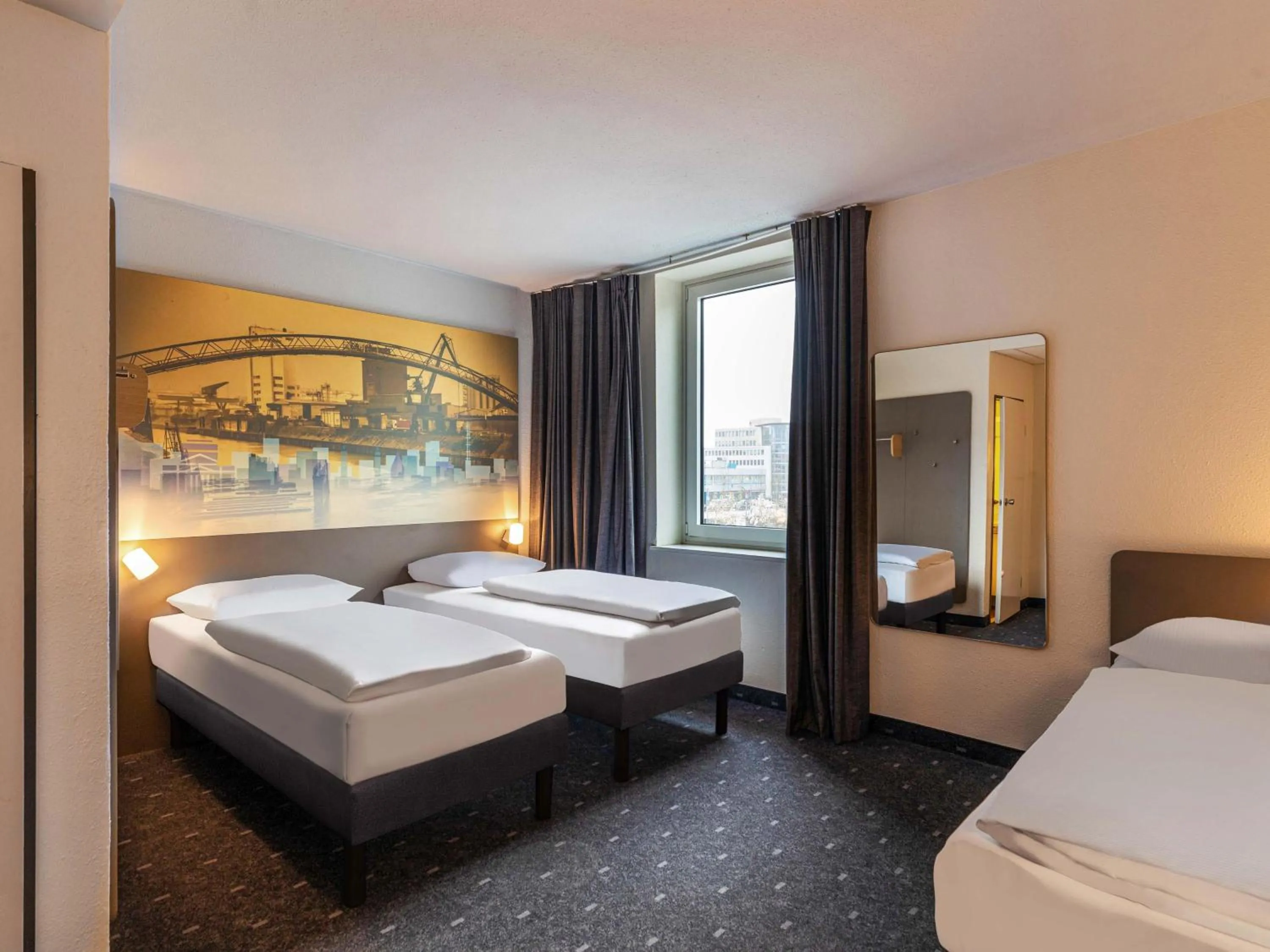 Photo of the whole room, Bed in B&B Hotel Duisburg Hbf-Nord