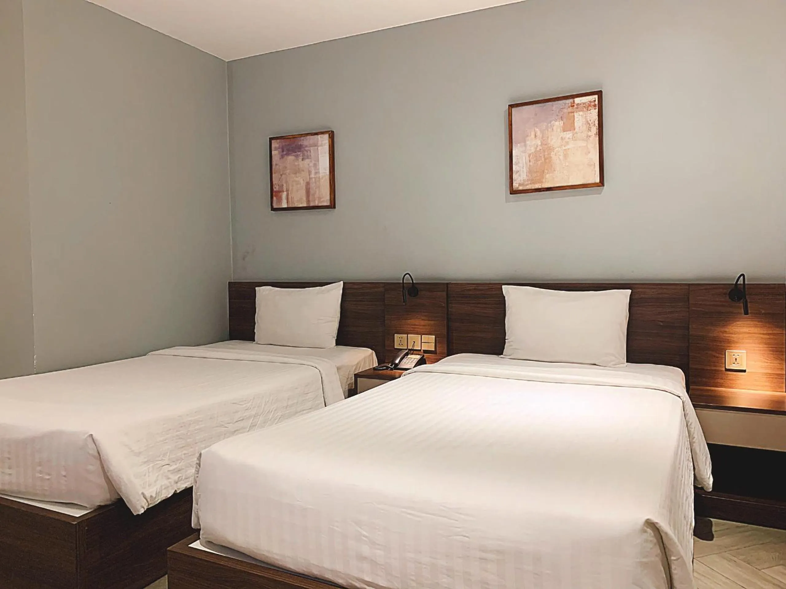 Bed in CHAU KHUONG HOTEL