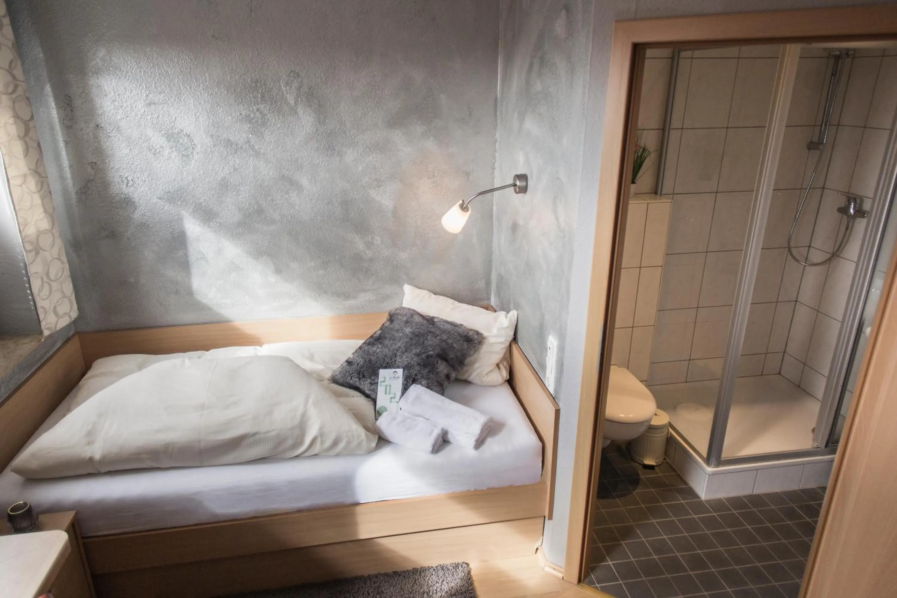 Bed in Schwiizeralp Hotel & Restaurant