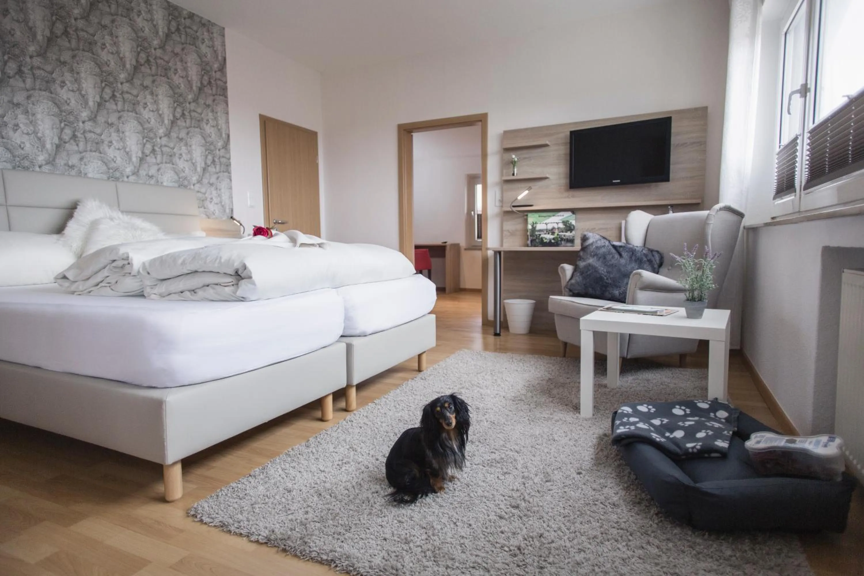 Photo of the whole room, Bed in Schwiizeralp Hotel & Restaurant