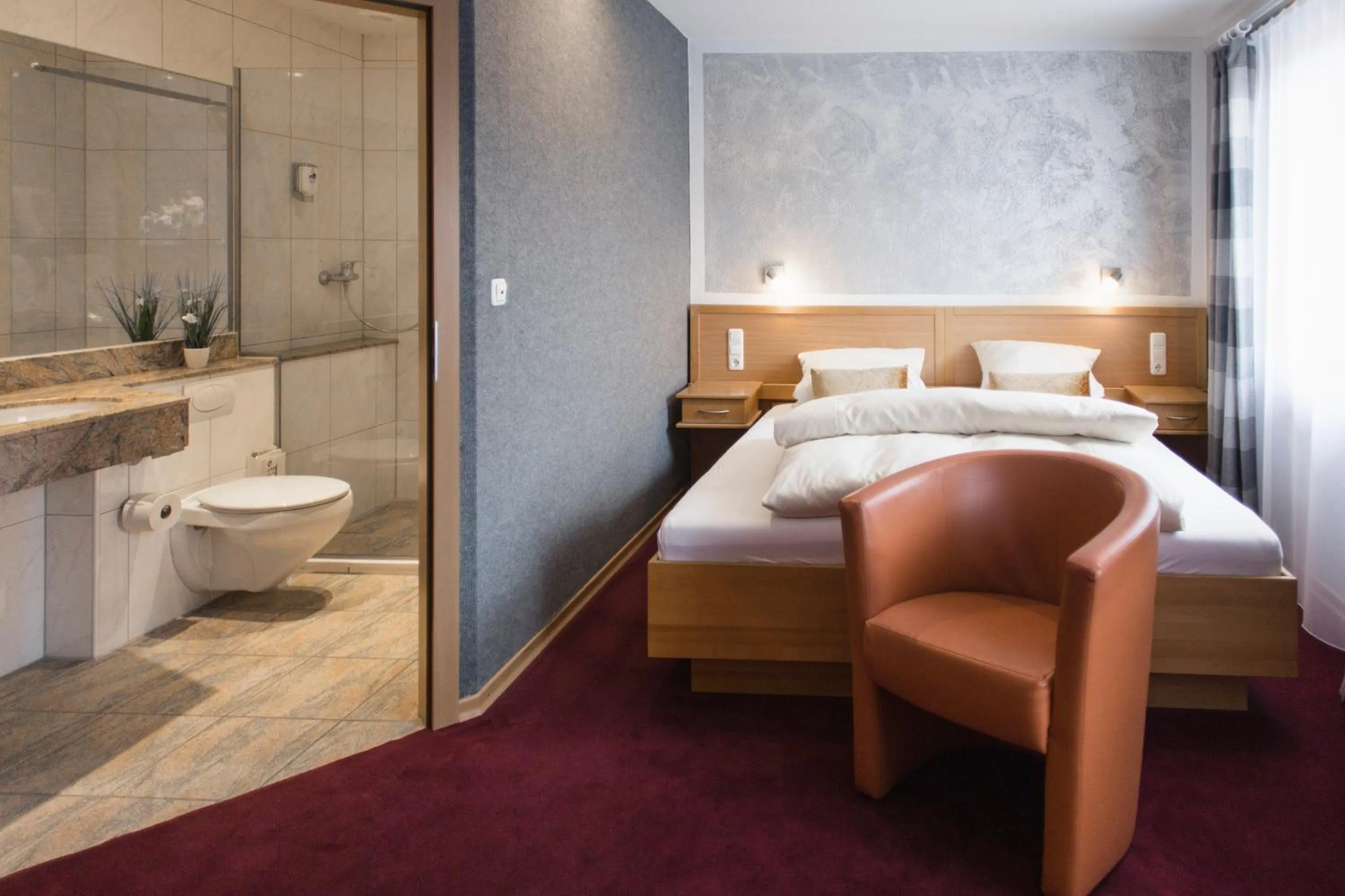 Bed in Schwiizeralp Hotel & Restaurant