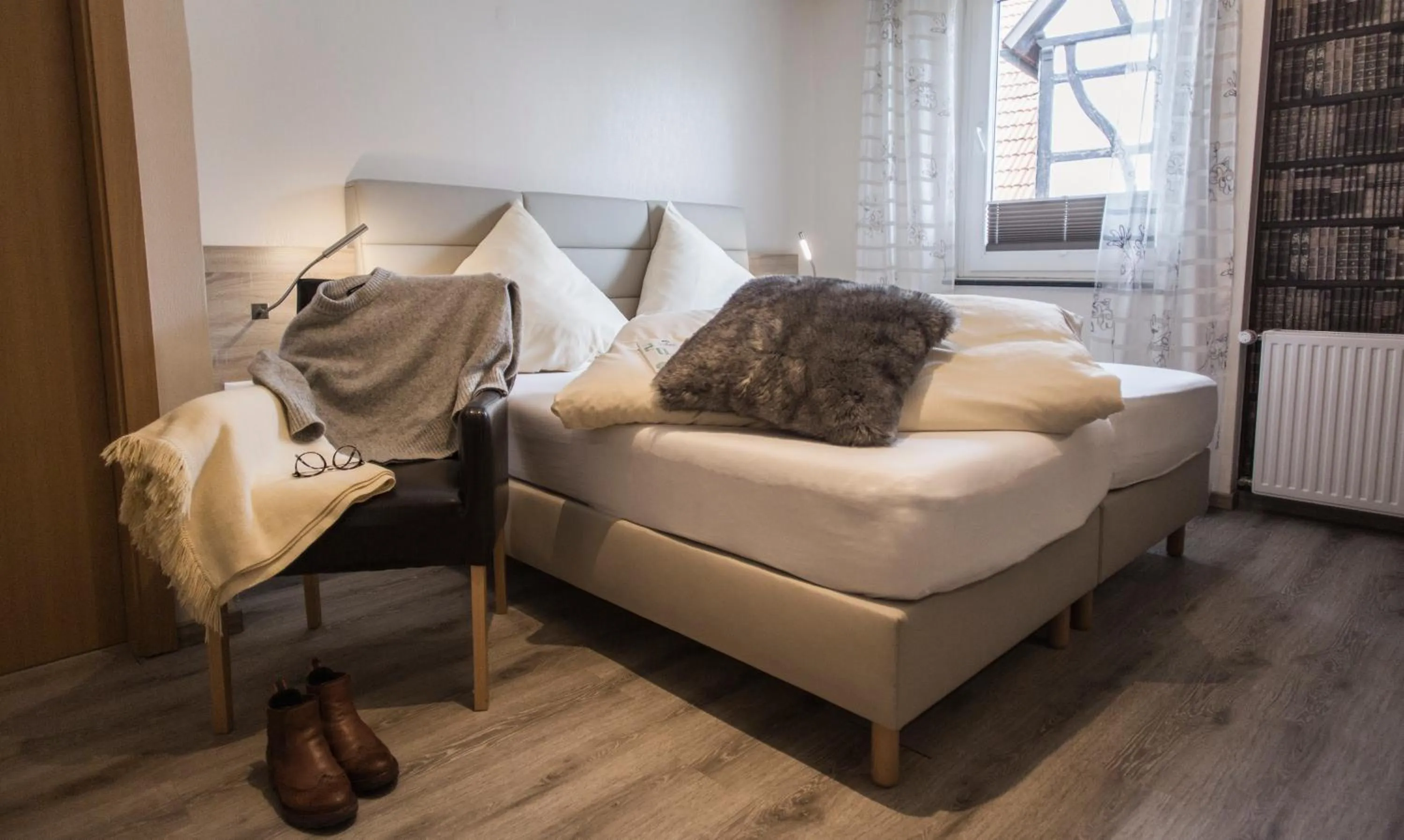 Photo of the whole room, Bed in Schwiizeralp Hotel & Restaurant