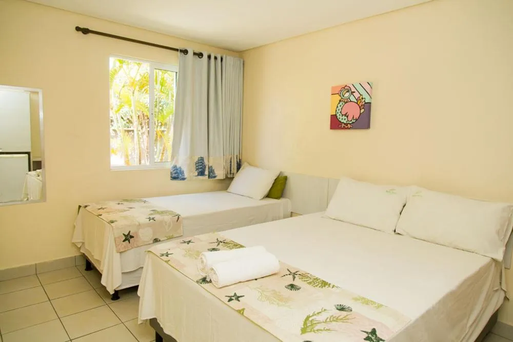 Bed in Pousada Água Viva