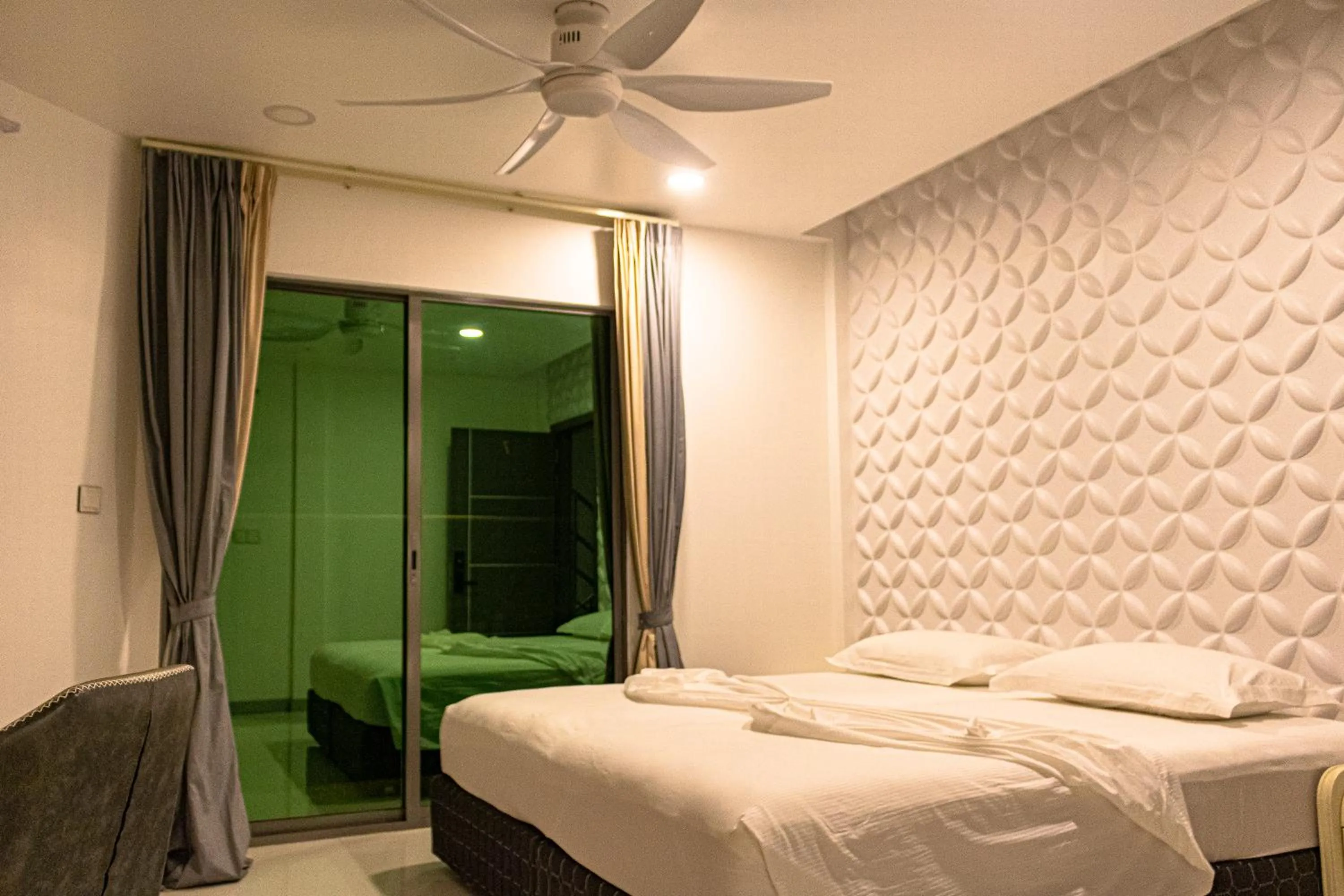 Bed in Wow Inn Keyodhoo