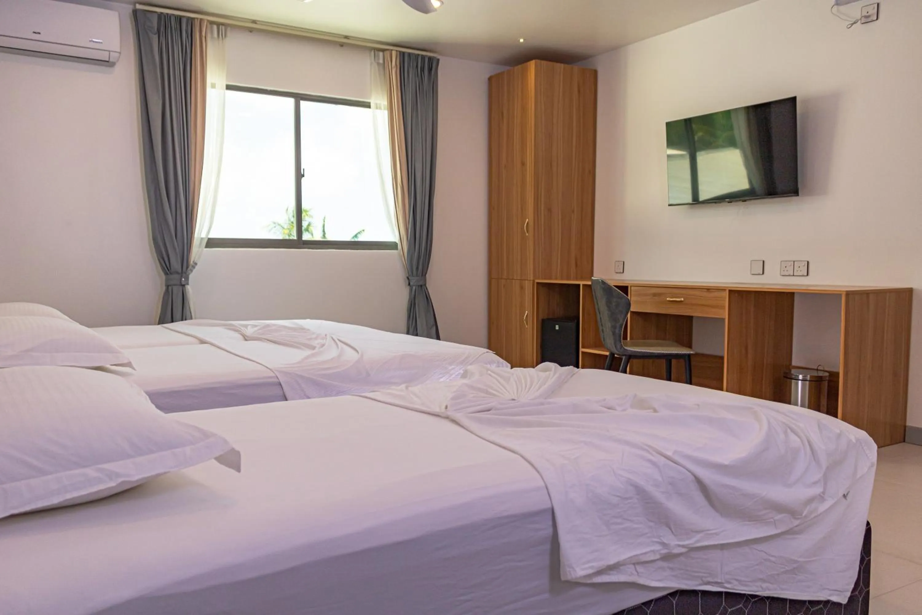 Bed in Wow Inn Keyodhoo