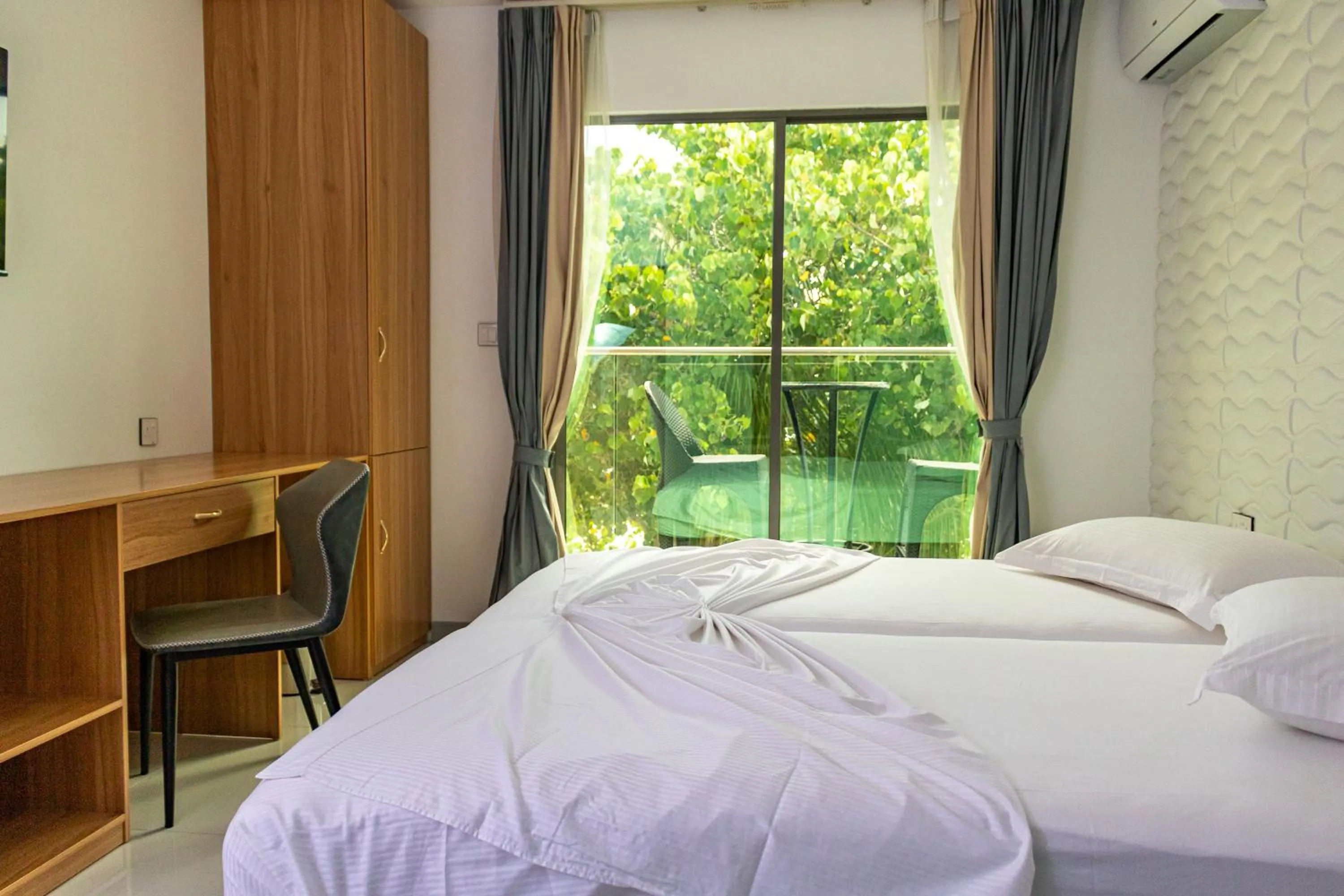 Bed in Wow Inn Keyodhoo