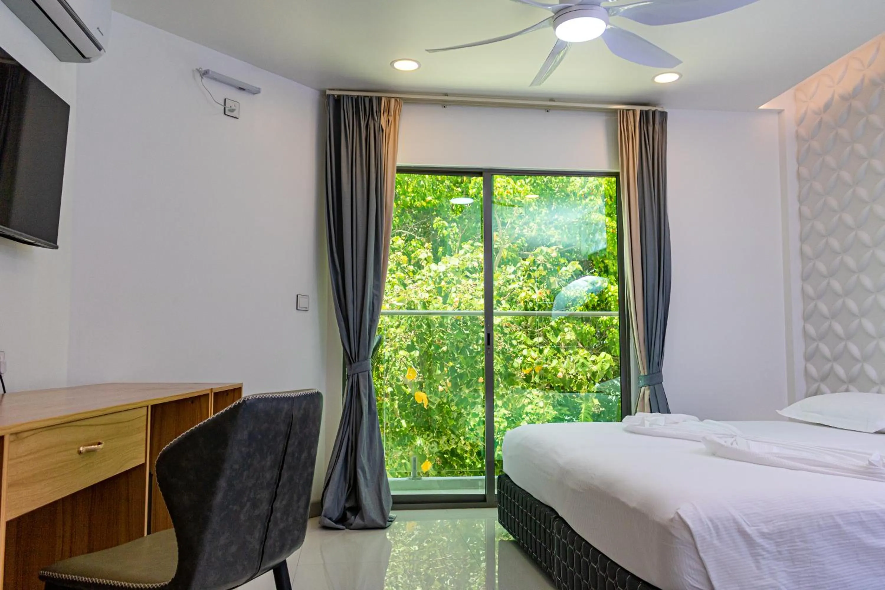 Bed in Wow Inn Keyodhoo