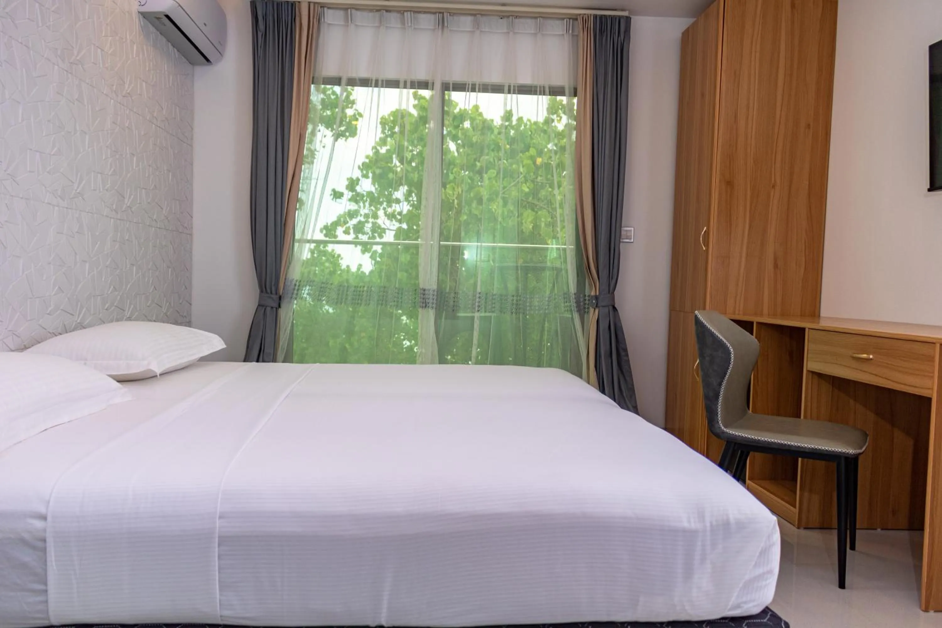 Bed in Wow Inn Keyodhoo