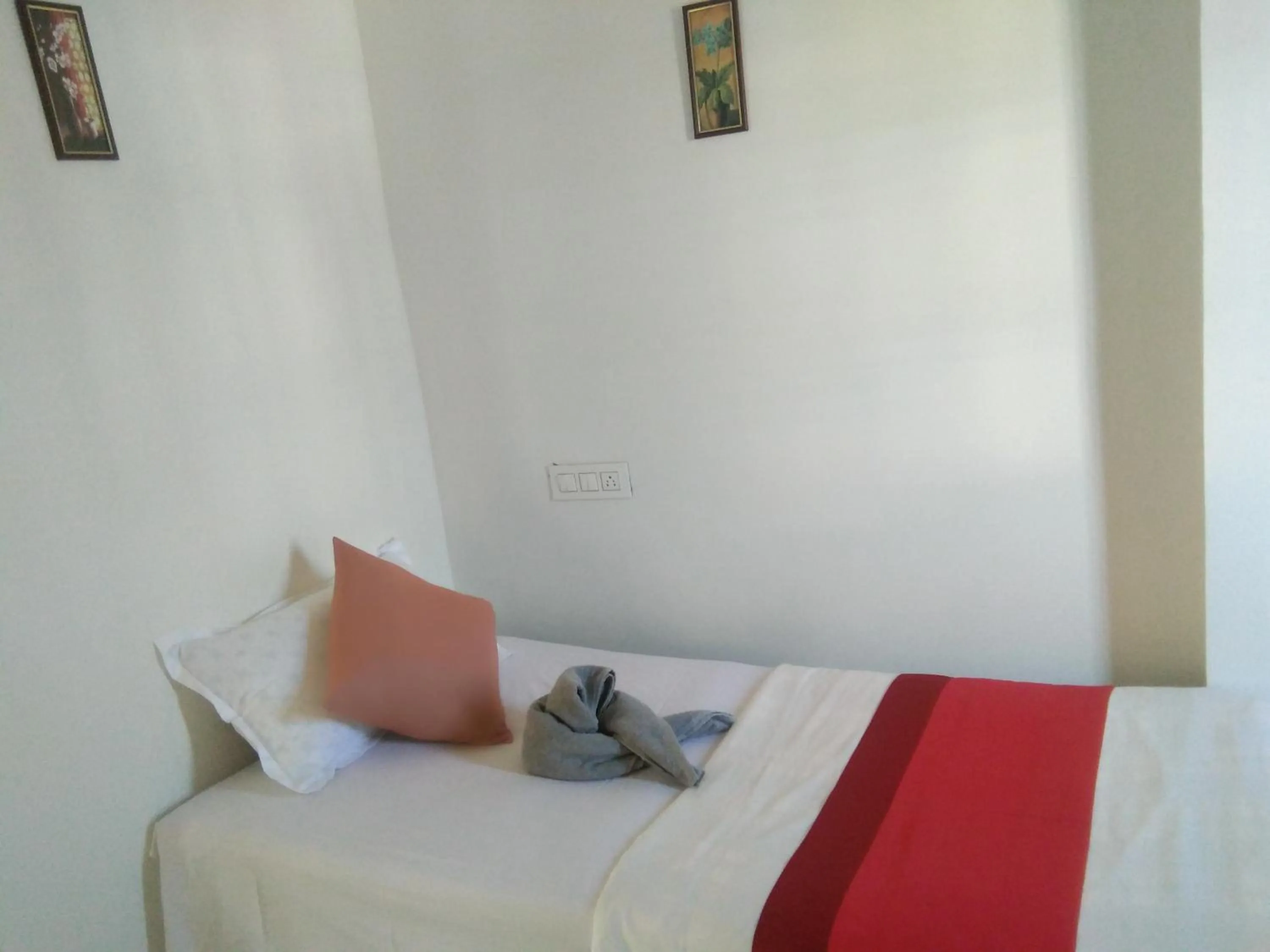 Bed in Sukun Guest House