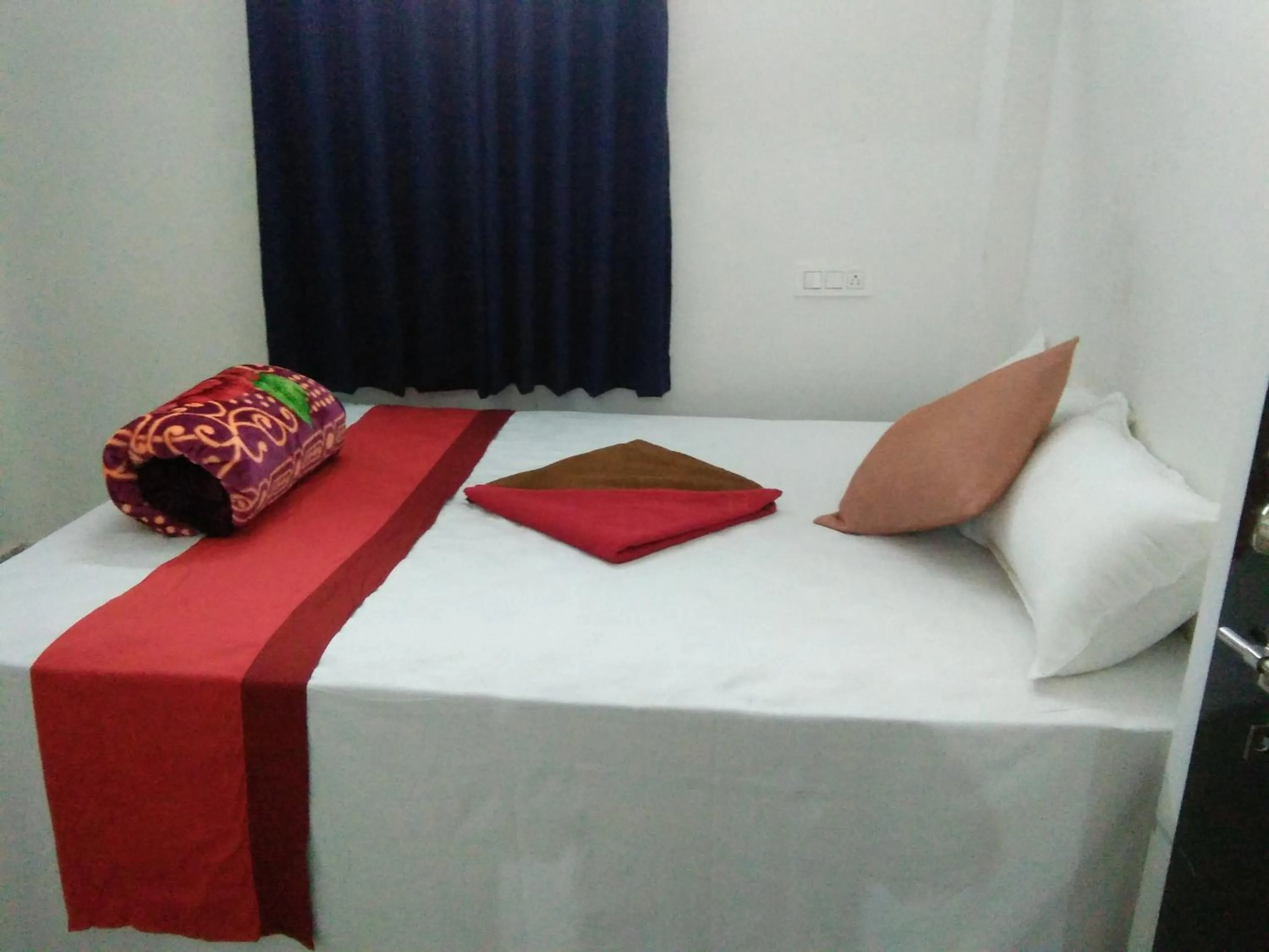 Bed in Sukun Guest House