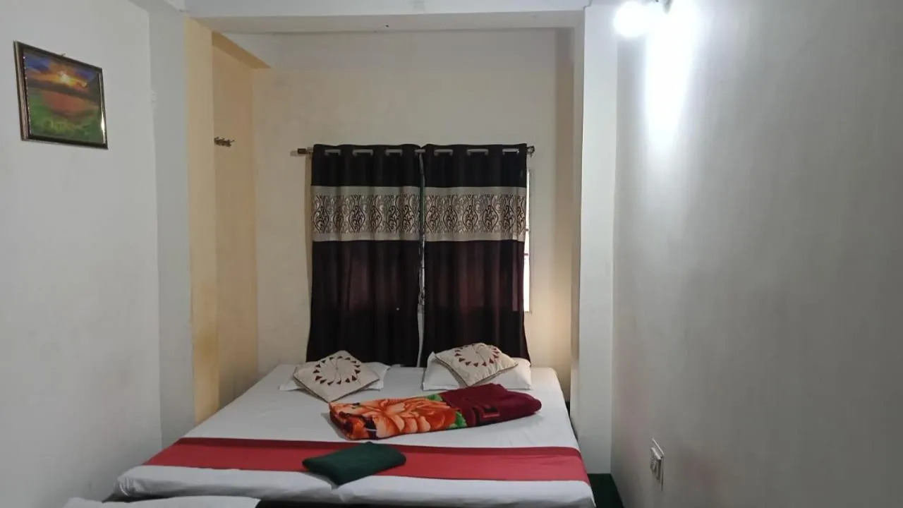 Bed in Sukun Guest House