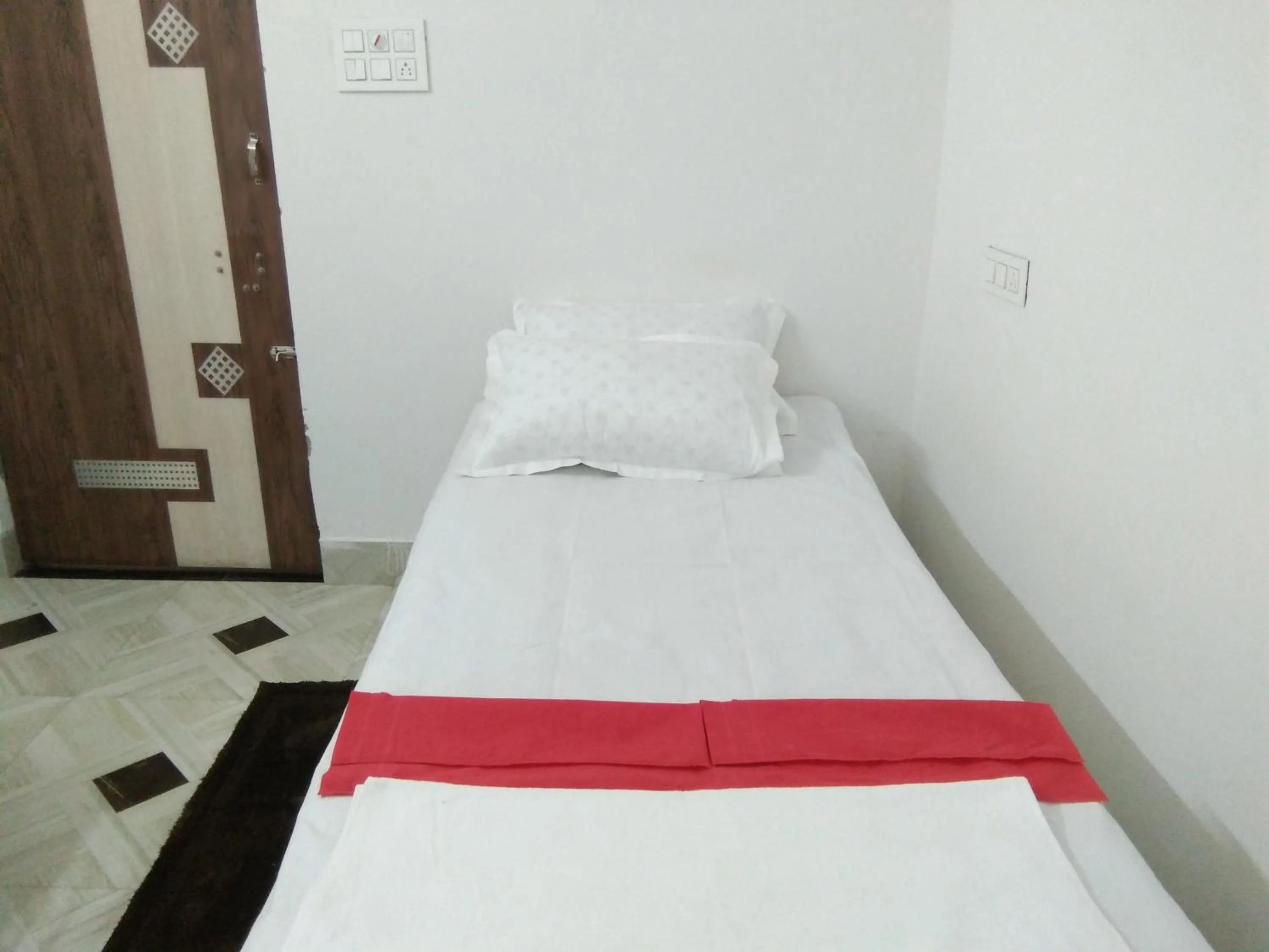 Bed in Sukun Guest House