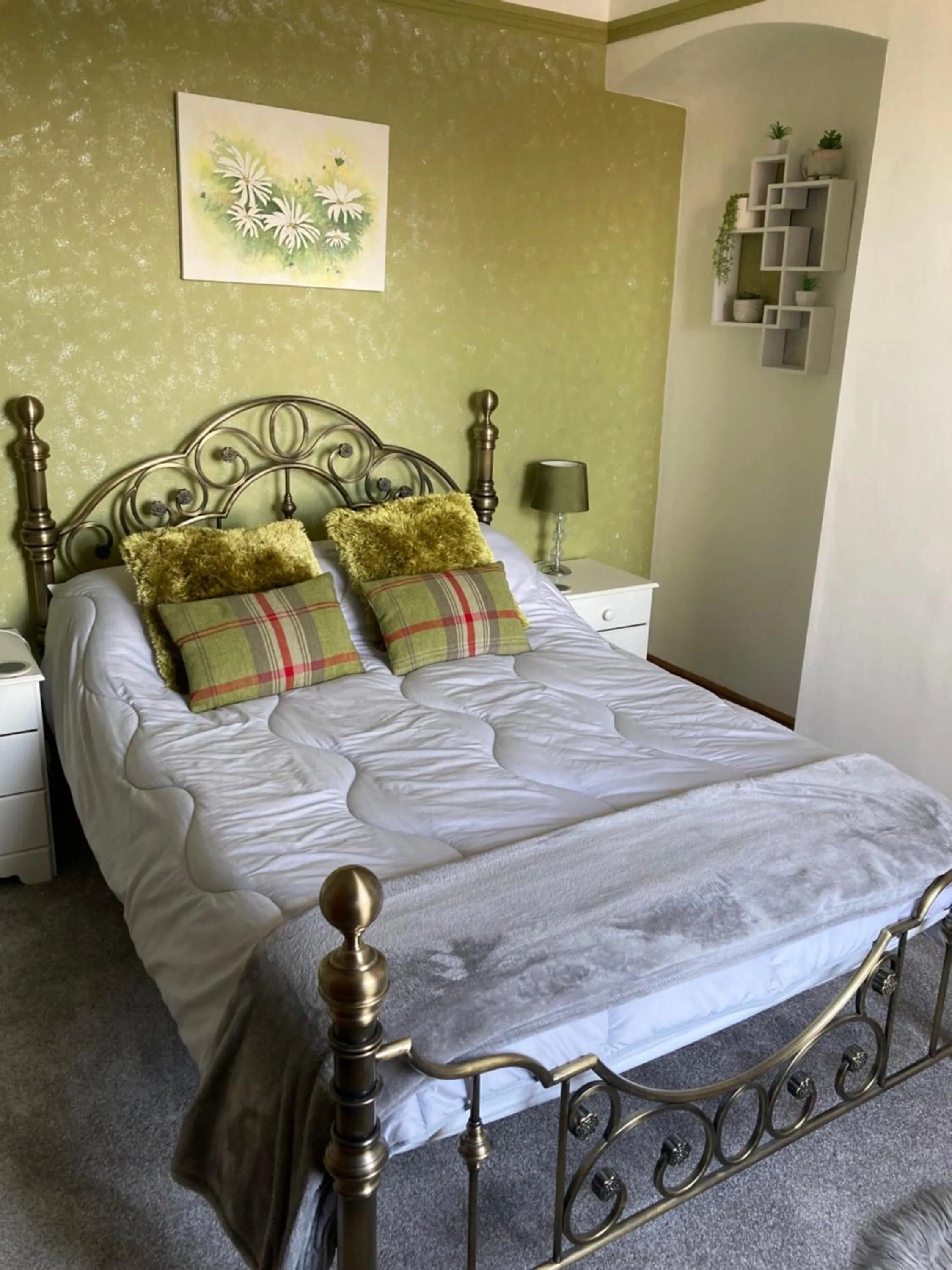 Bed in Ellies Guest House