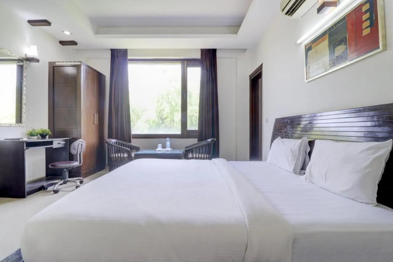 Bedroom, Bed in Blue Moon Residency Hotel & Restaurant