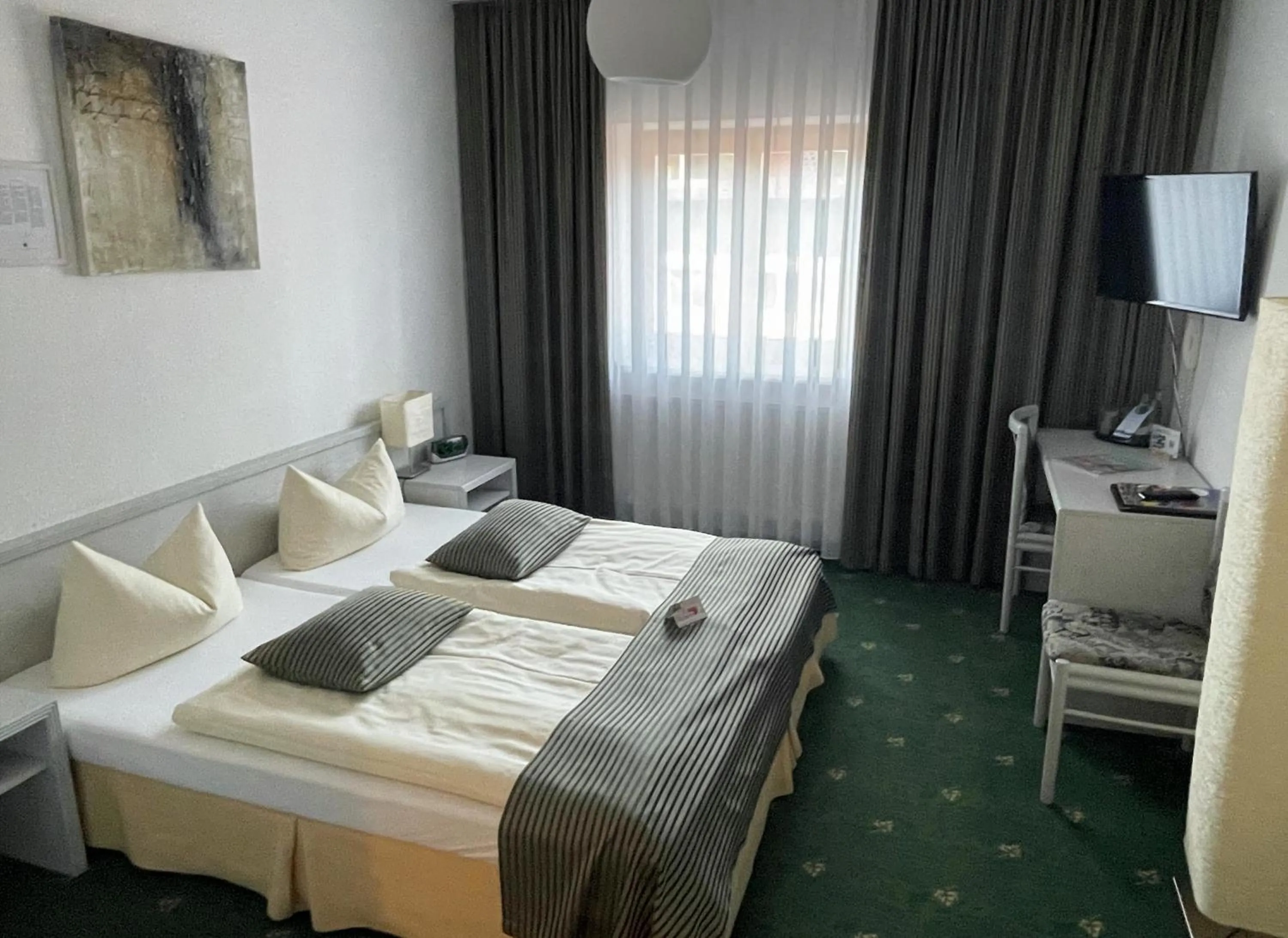 Photo of the whole room, Bed in Akzent Berghotel Rosstrappe