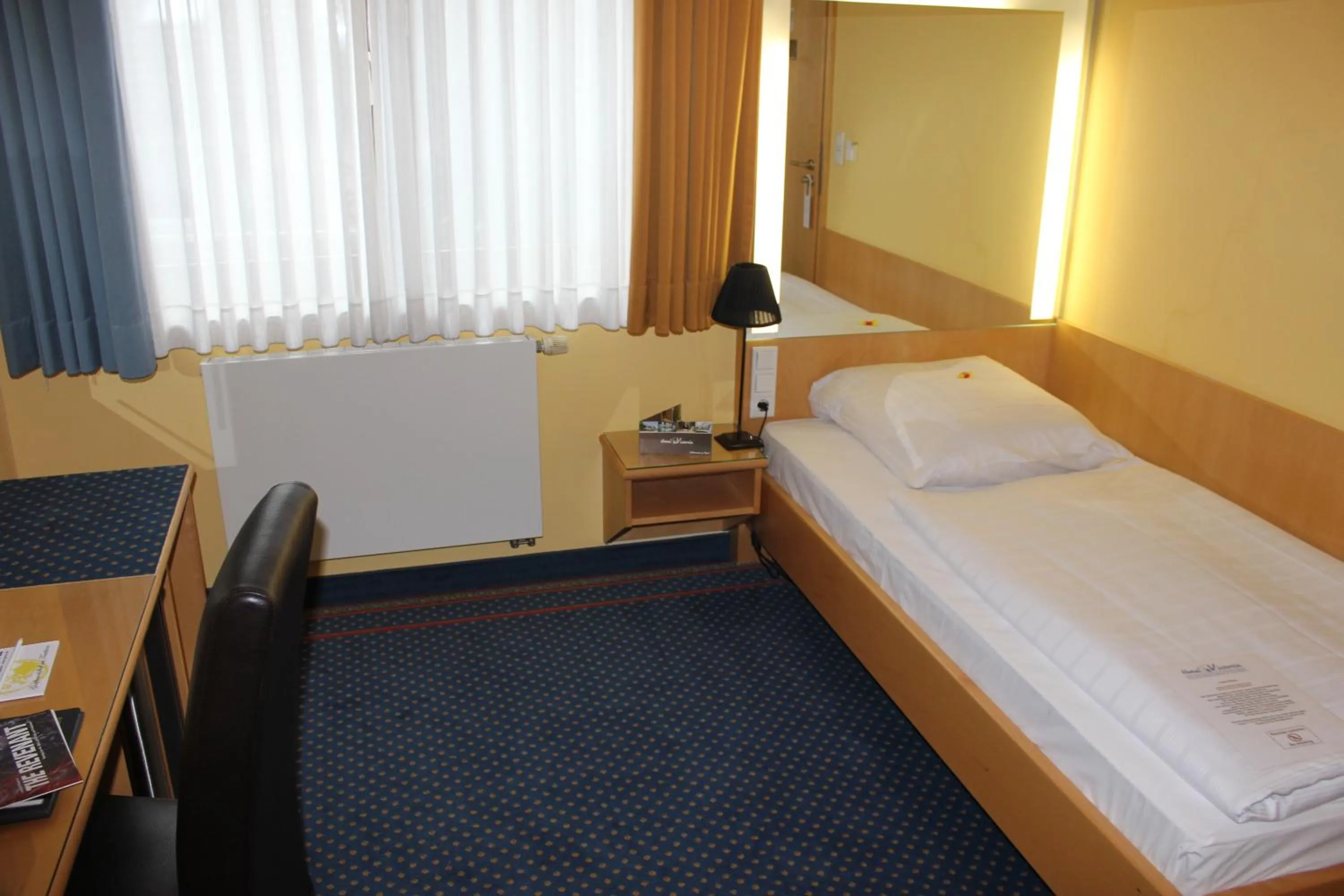 Bed in Hotel Victoria