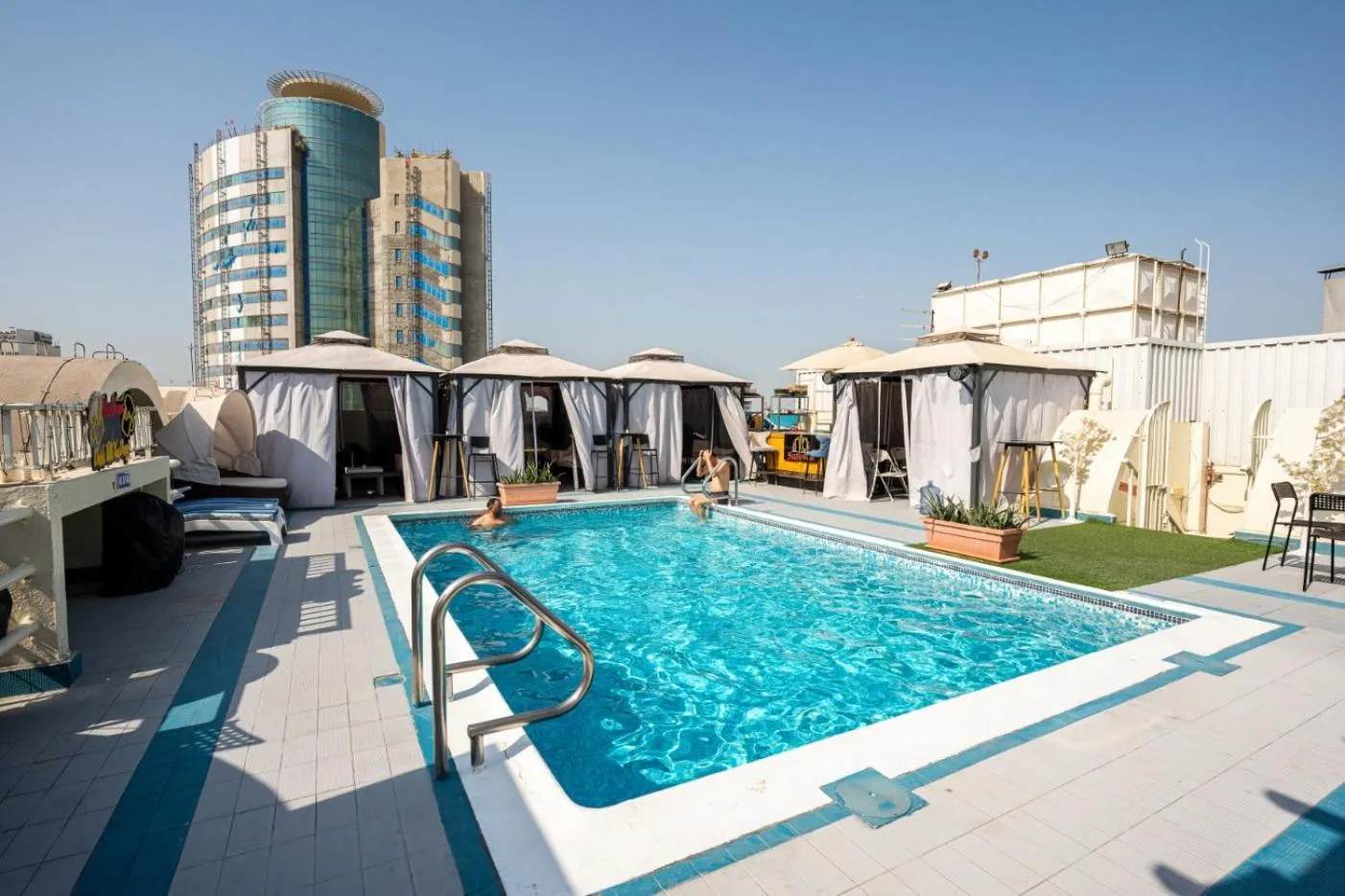 Swimming pool in Al Khaleej Palace Deira Hotel