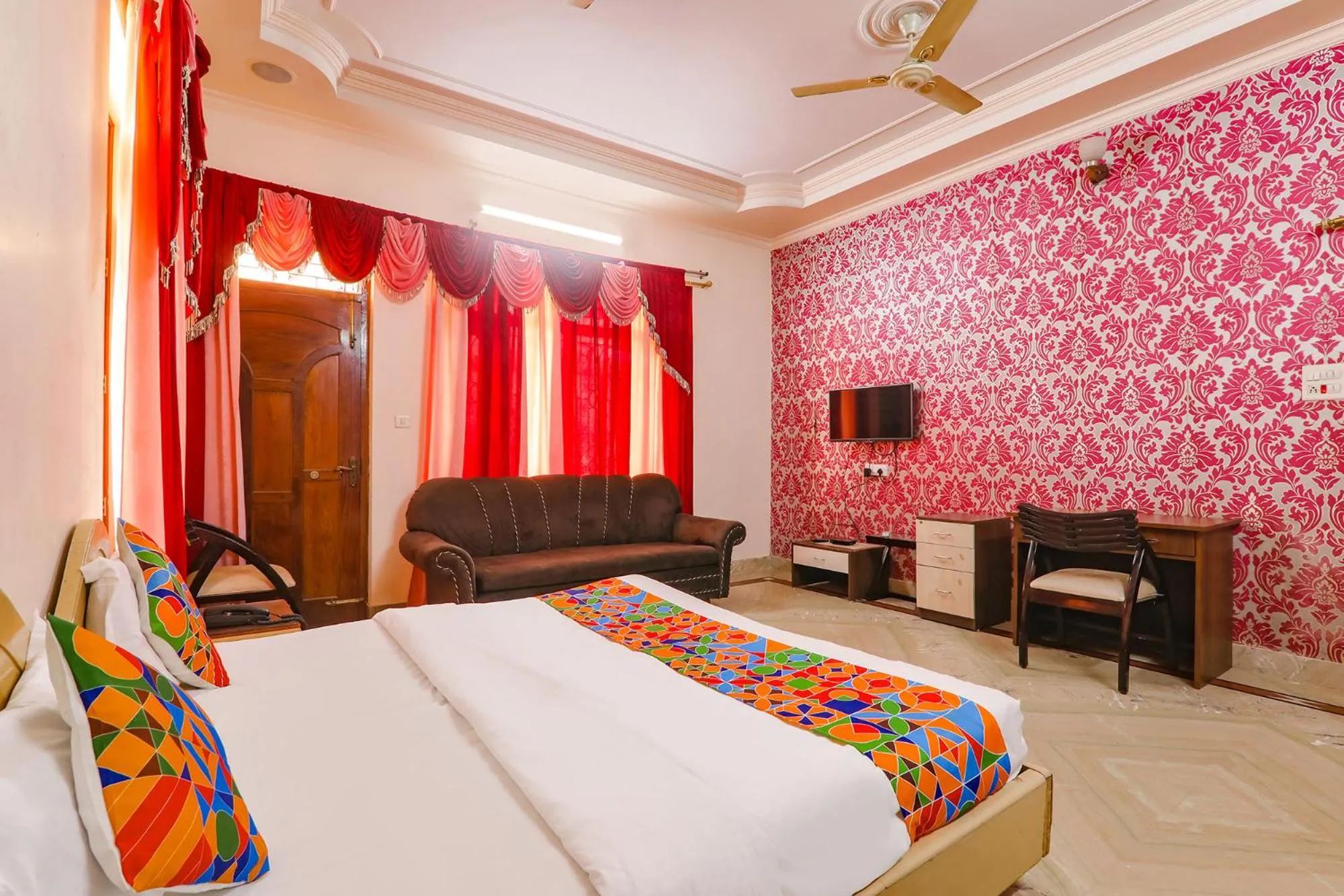 Bed in FabHotel Raka Inn