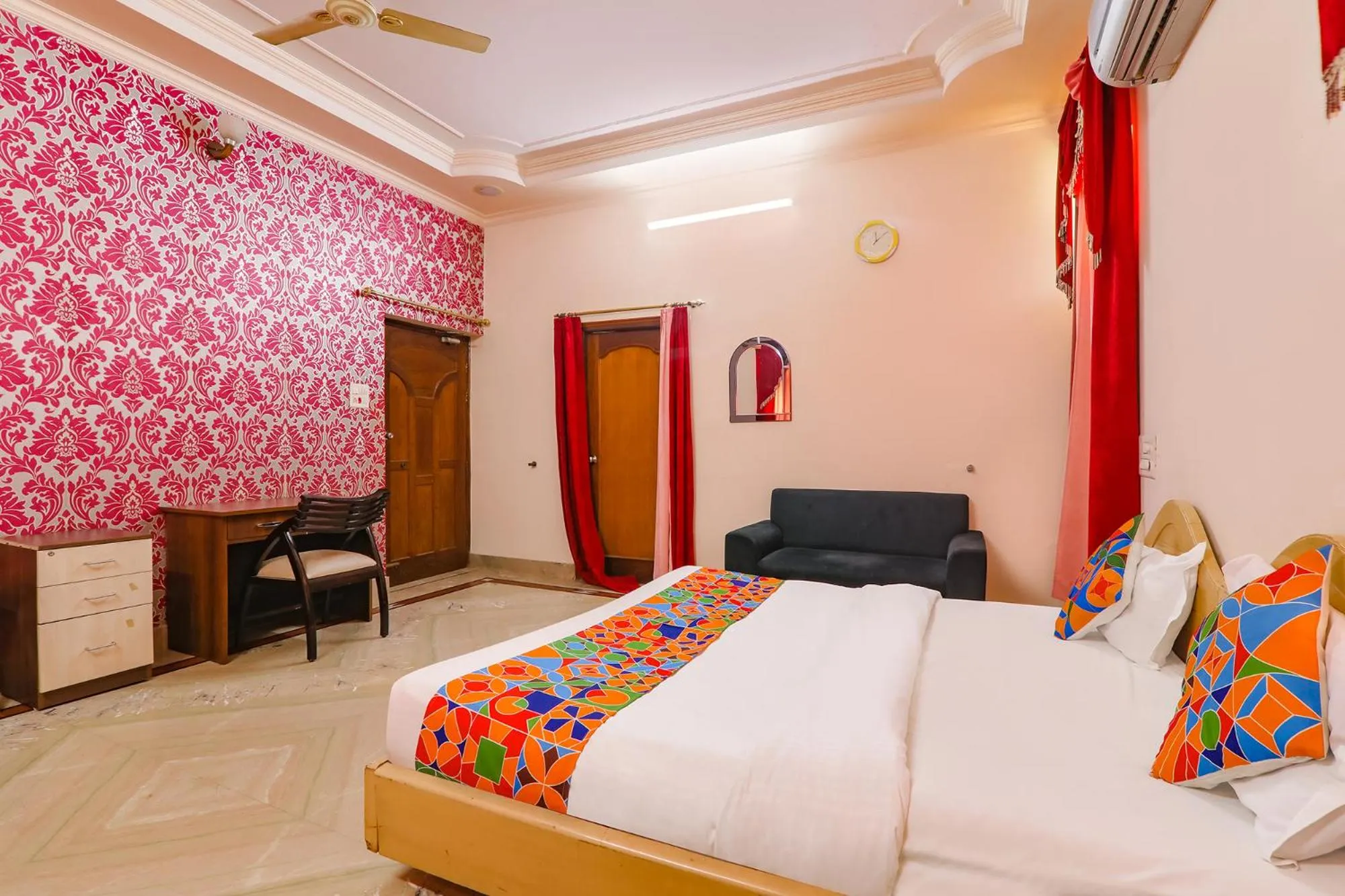 Bed in FabHotel Raka Inn